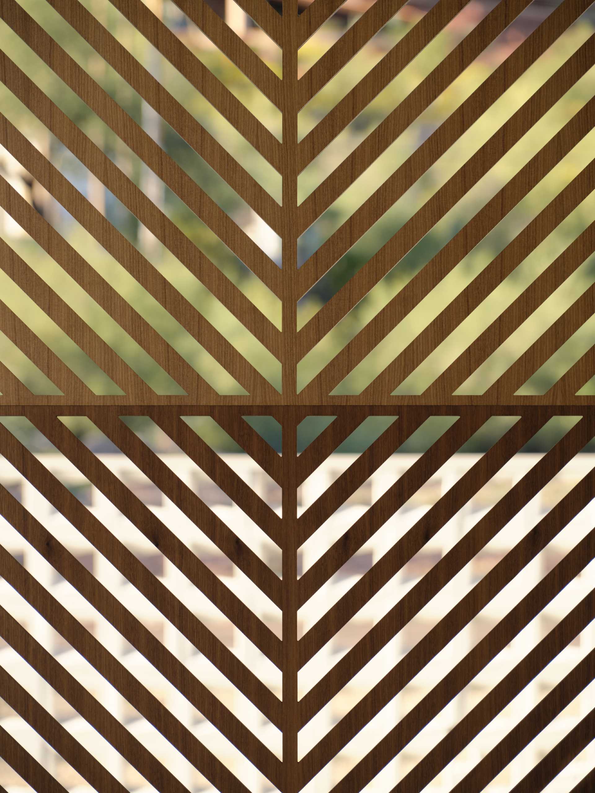 A wood partition screen with wood panels inspired by palm fronds.
