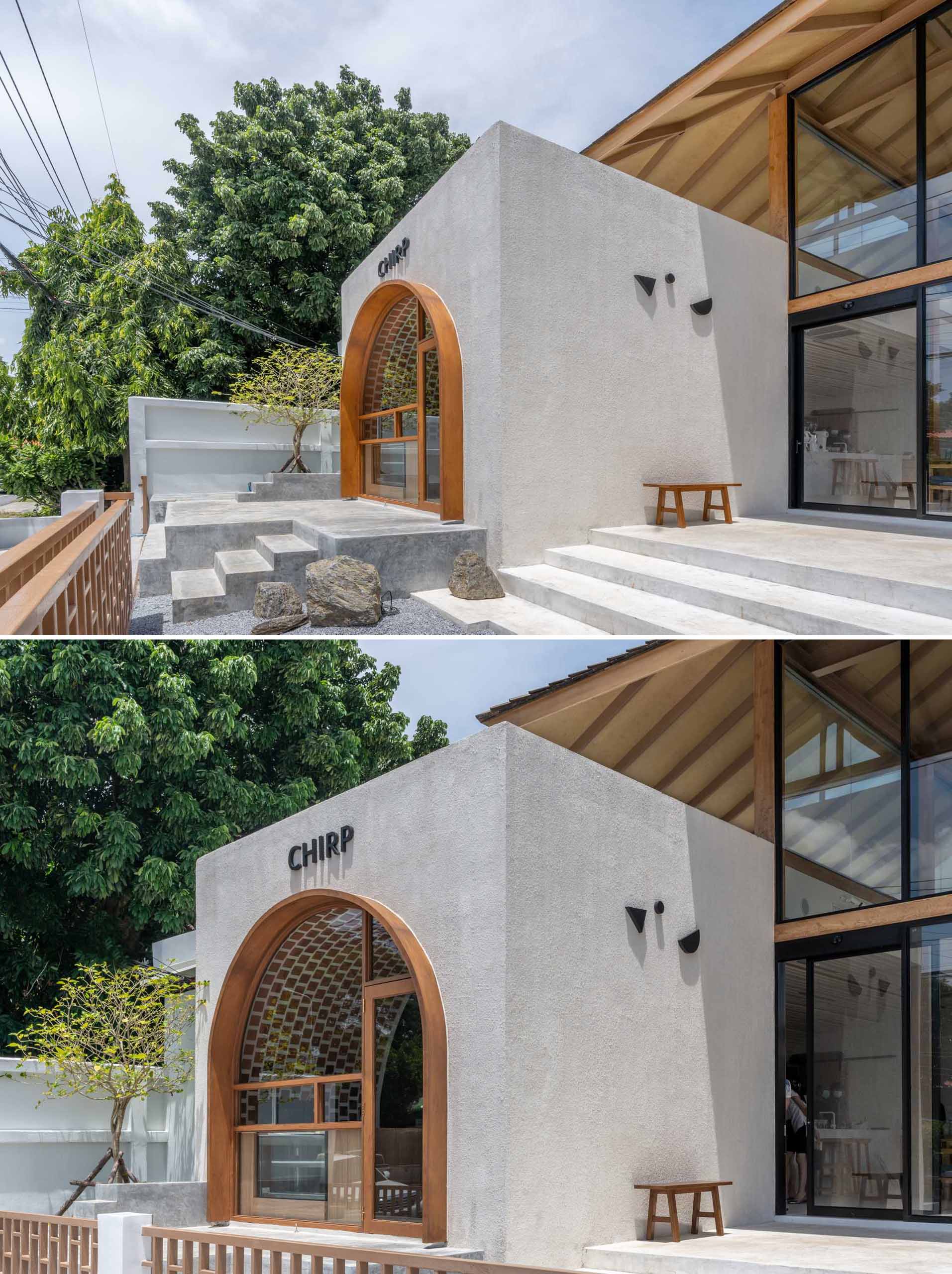 A small cafe with facade that features an arched window detail, and an interior with gradient tiles.