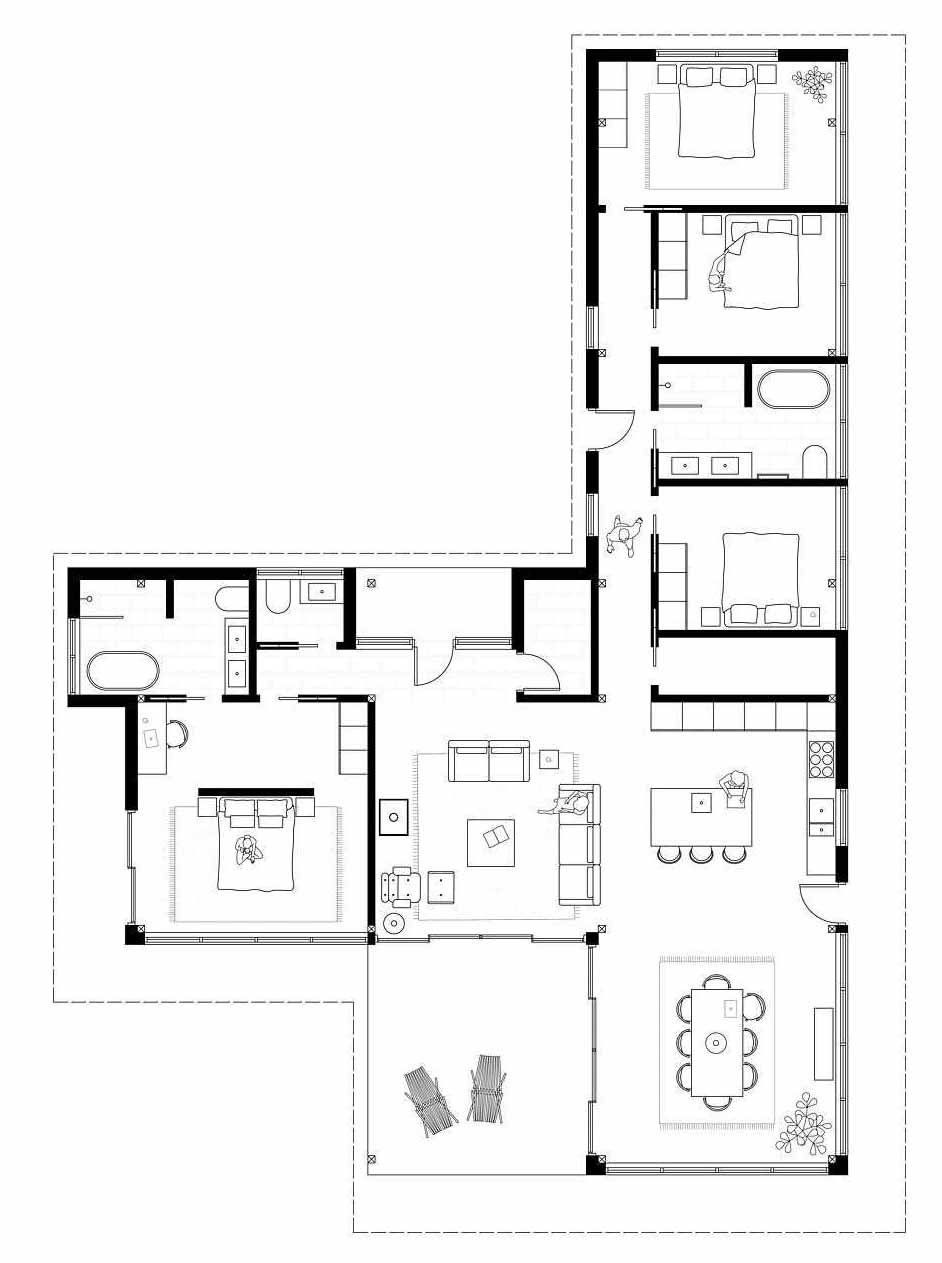 A modern L-shaped cottage home with a separate wing for the primary suite and rooms for the teenagers.