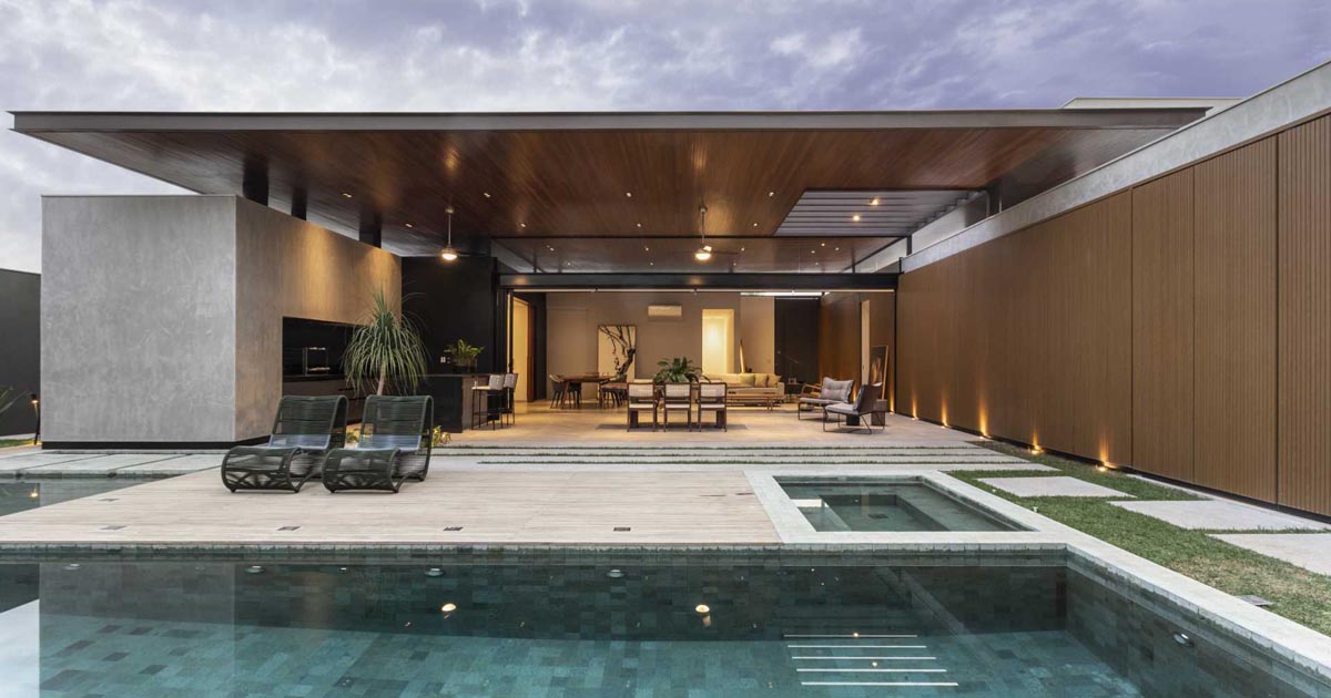 A Large Double Height Ceiling Allows The Social Areas Of This Home To Open Completely To The Outside