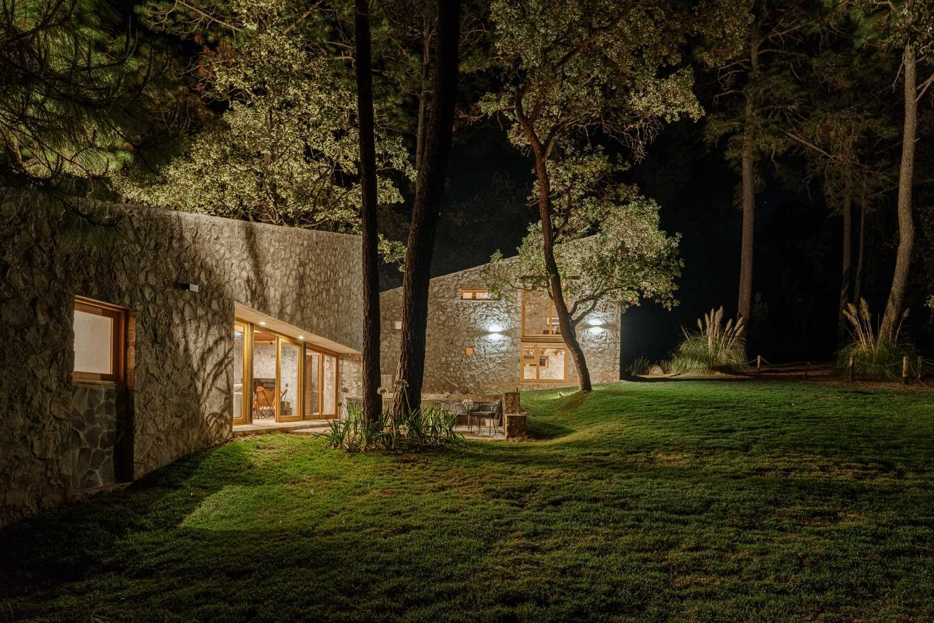 A contemporary stone, wood, and glass home.