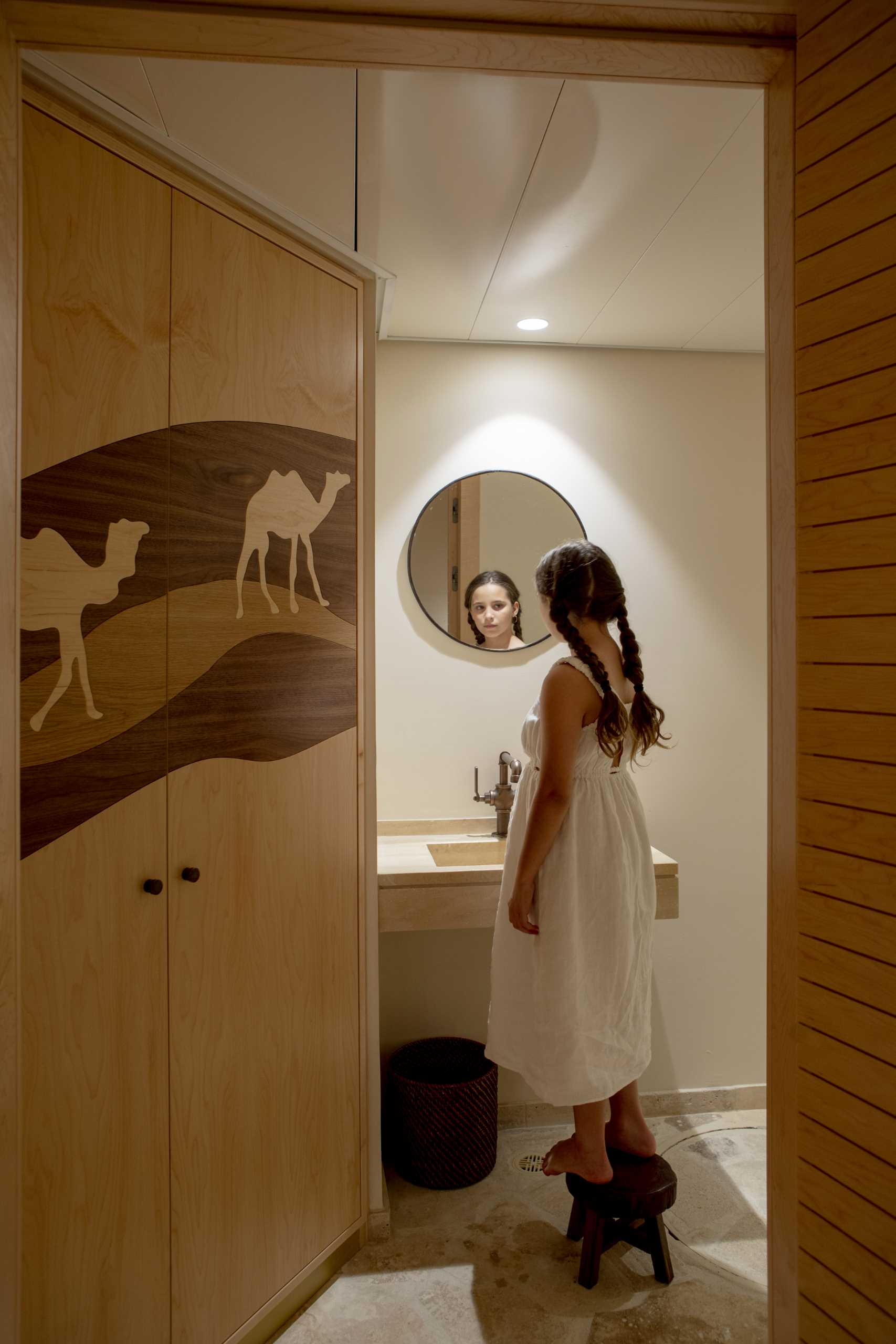 A modern kids playroom bathroom inspired by the desert.