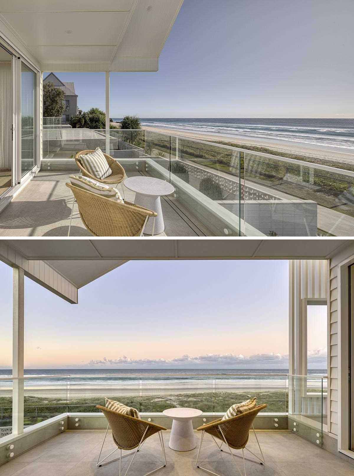 A modern coastal home with a covered balcony that look out to the beach.