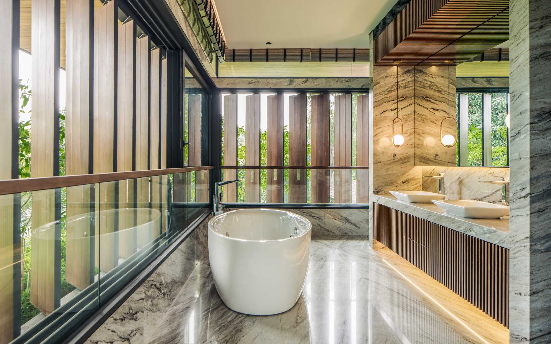 A modern bathroom with wood screens that create privacy and allow the natural light to filter through.