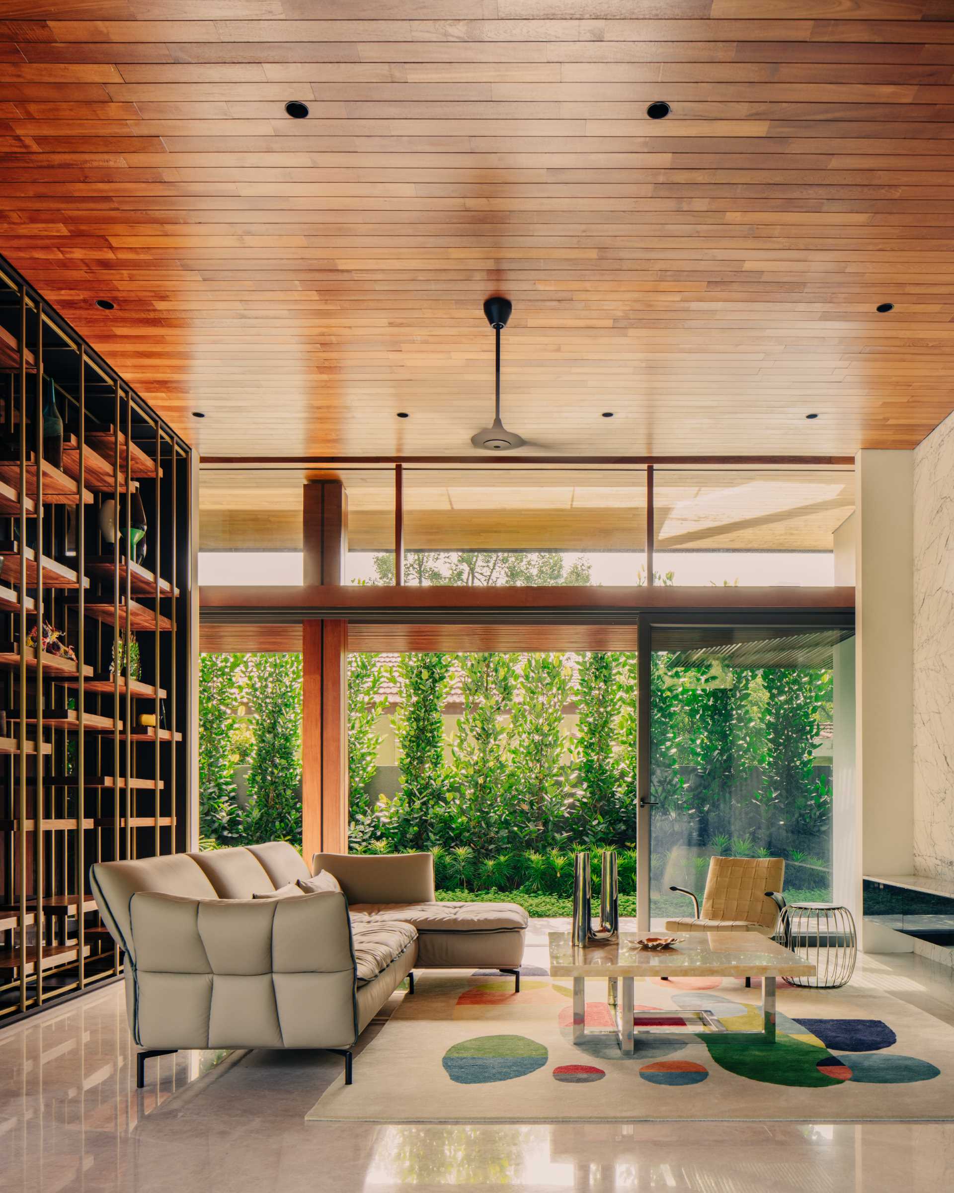 A modern living room with high wood ceilings.