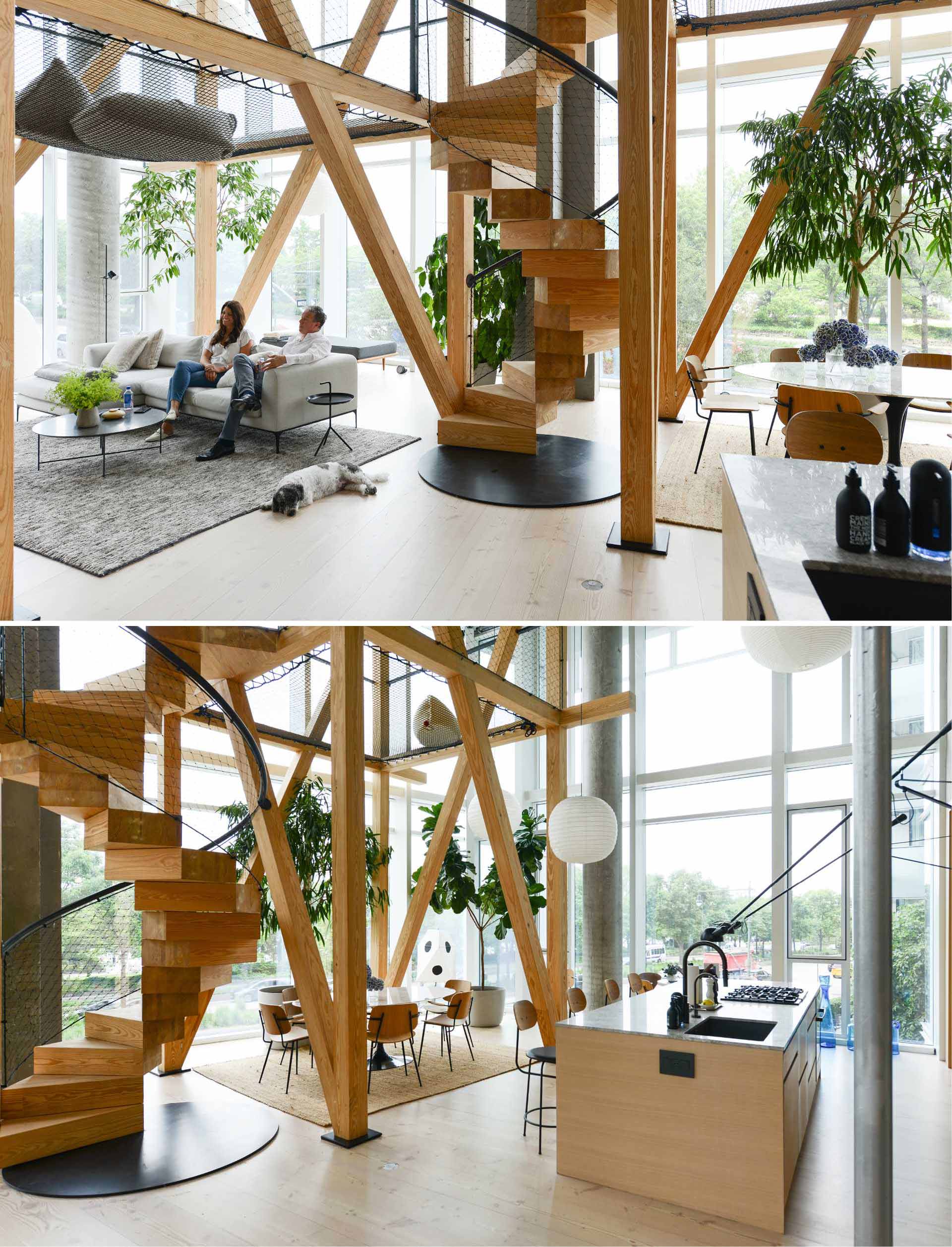 A modern apartment with 22 foot glass walls includes wood structure and netting that was inspired by a treehouse.