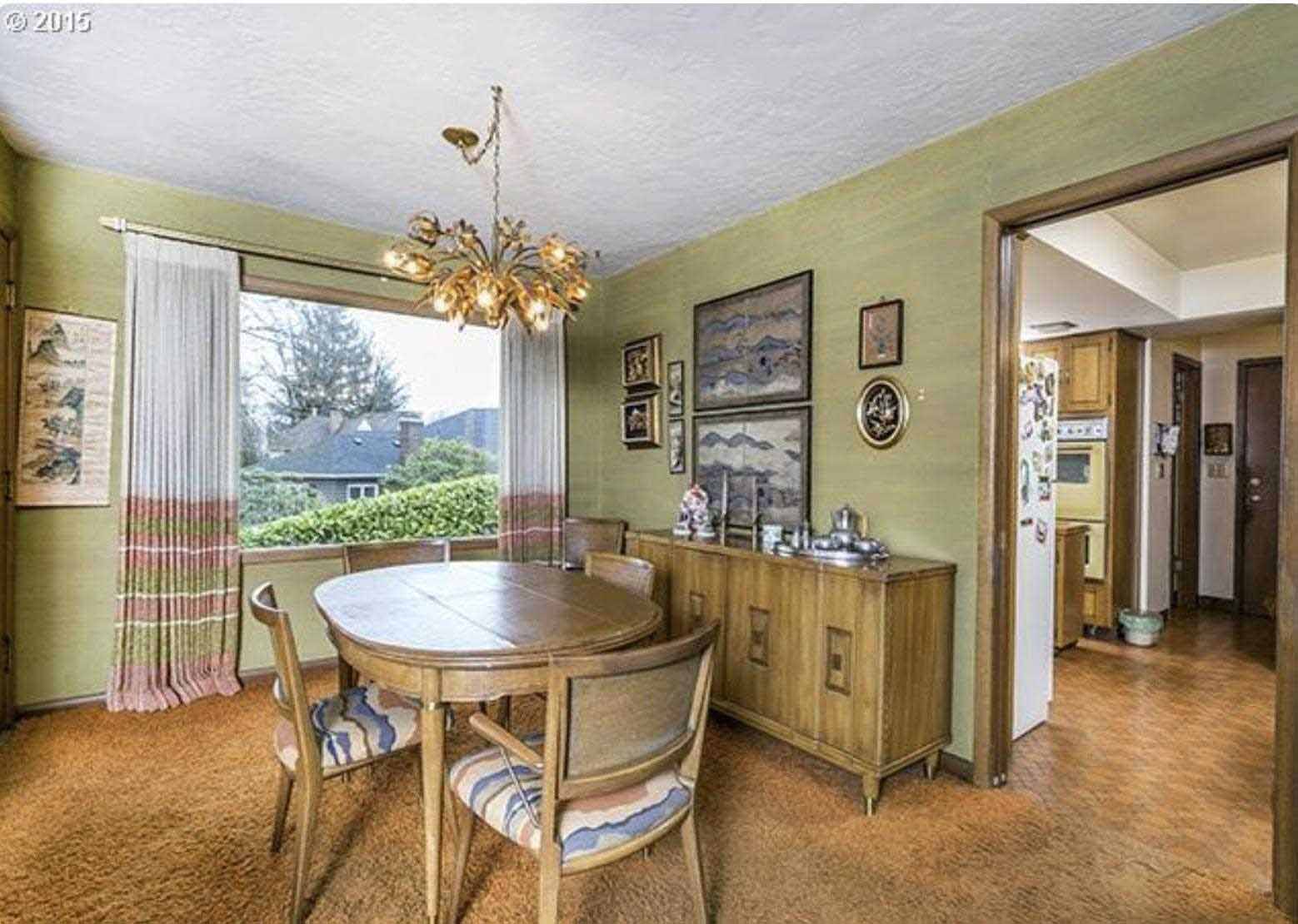 Before - The original dining room had green walls and orange carpet. 