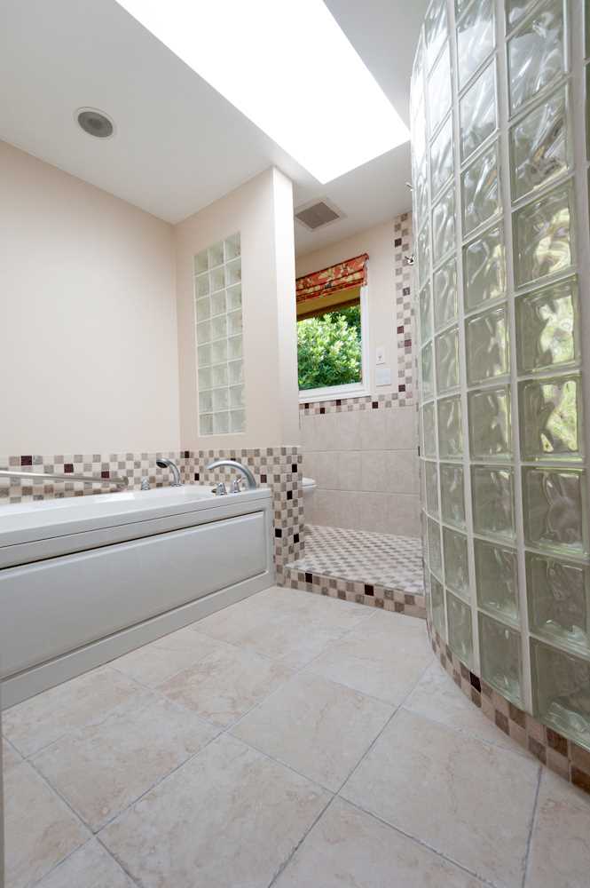 BEFORE - A bathroom with glass blocks.