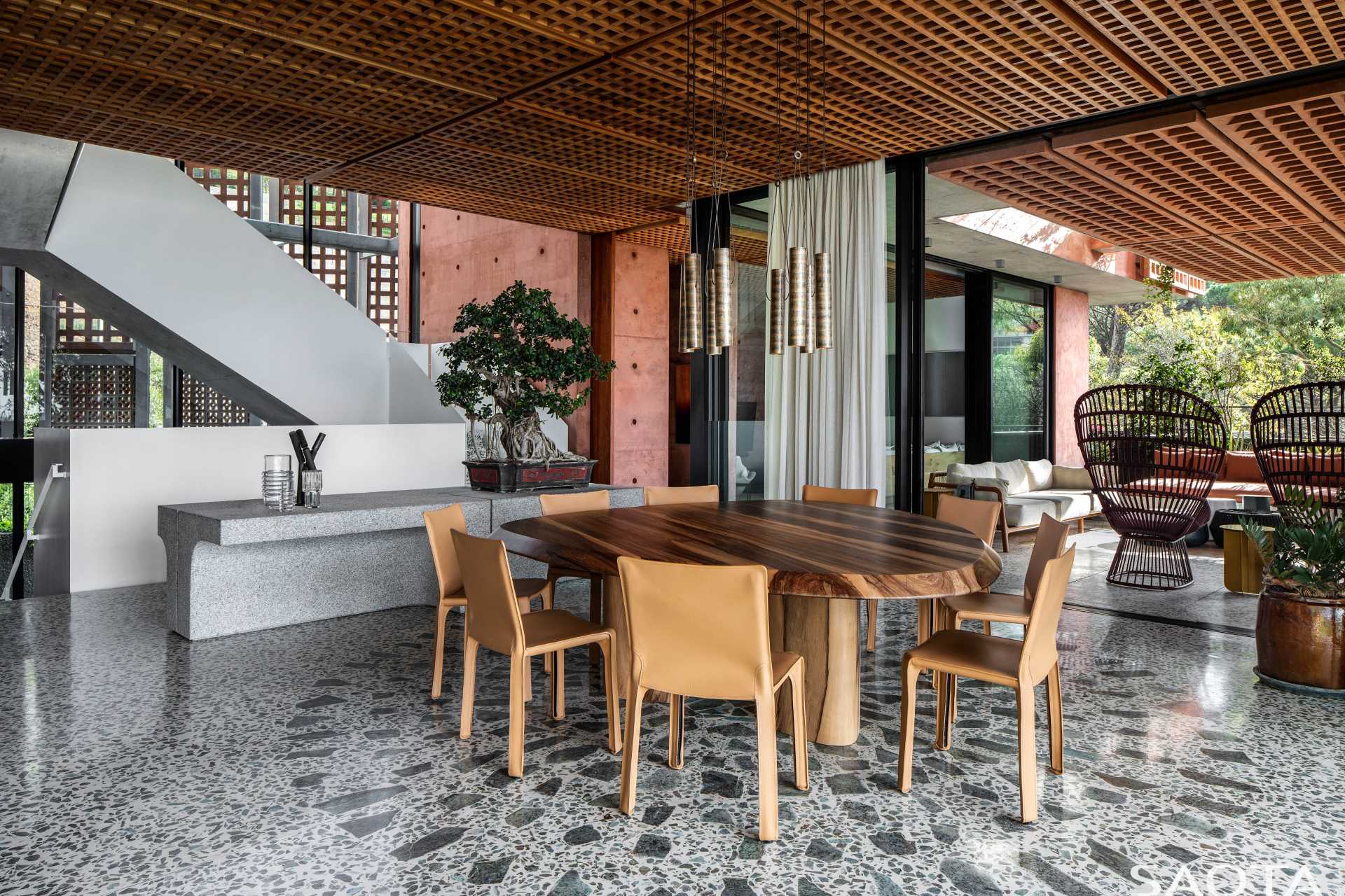 The main living room and dining area share the large open space, both of which enjoy city views.
