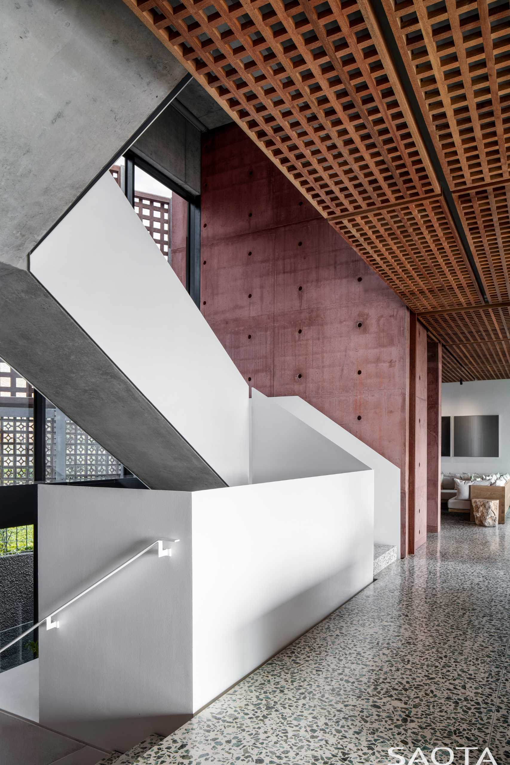 A staircase with a polished polymer concrete floor.