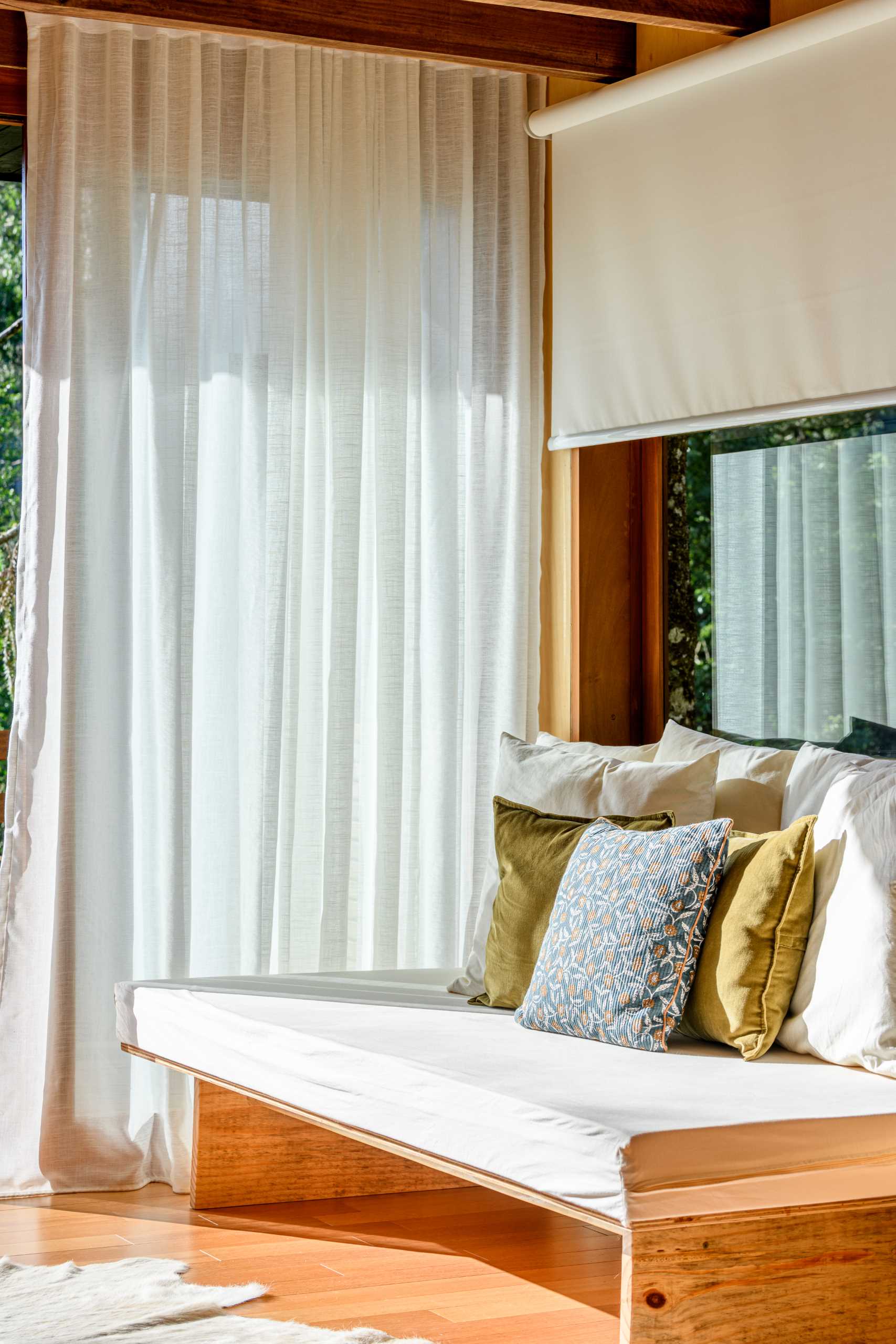 The living room of a small modern tree house in Brazil.