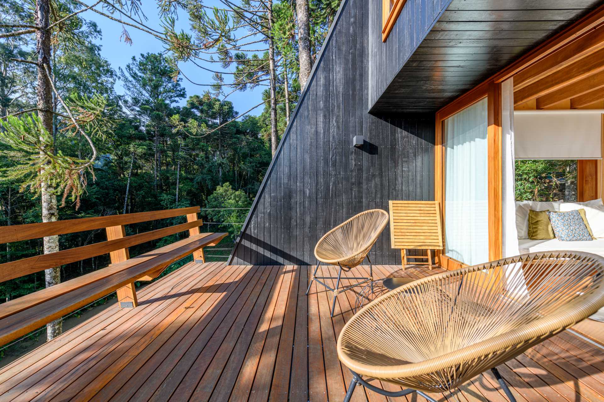 A modern tree house with a deck made from Eucalyptus wood.