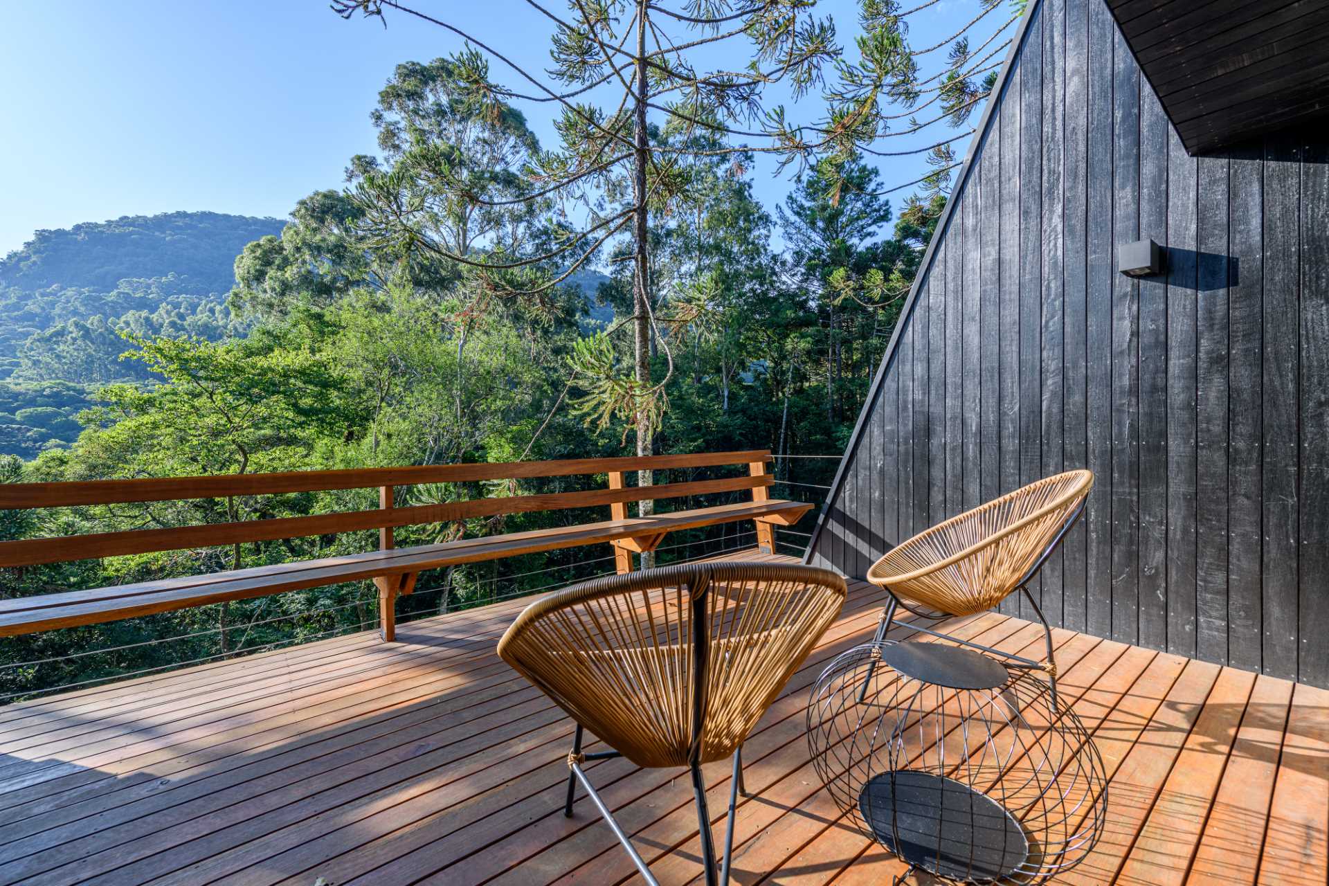 A modern tree house with a deck made from Eucalyptus wood.