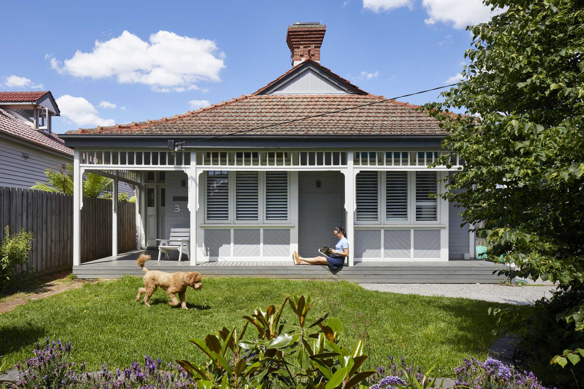 An Australian home with a wraparound porch.