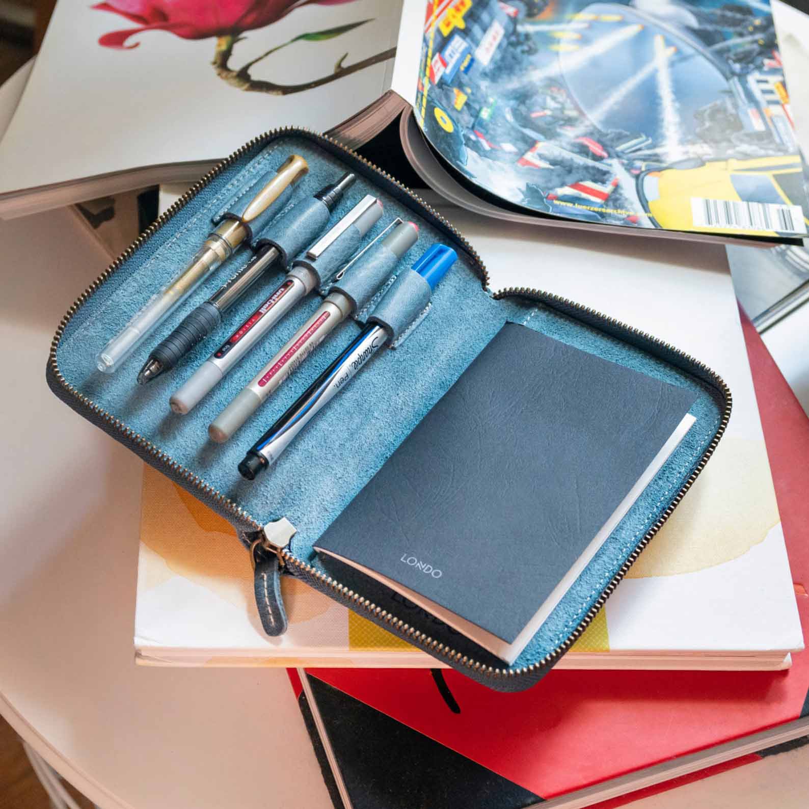 Modern Gift Idea - A hand crafted leather travel journal and organizer.