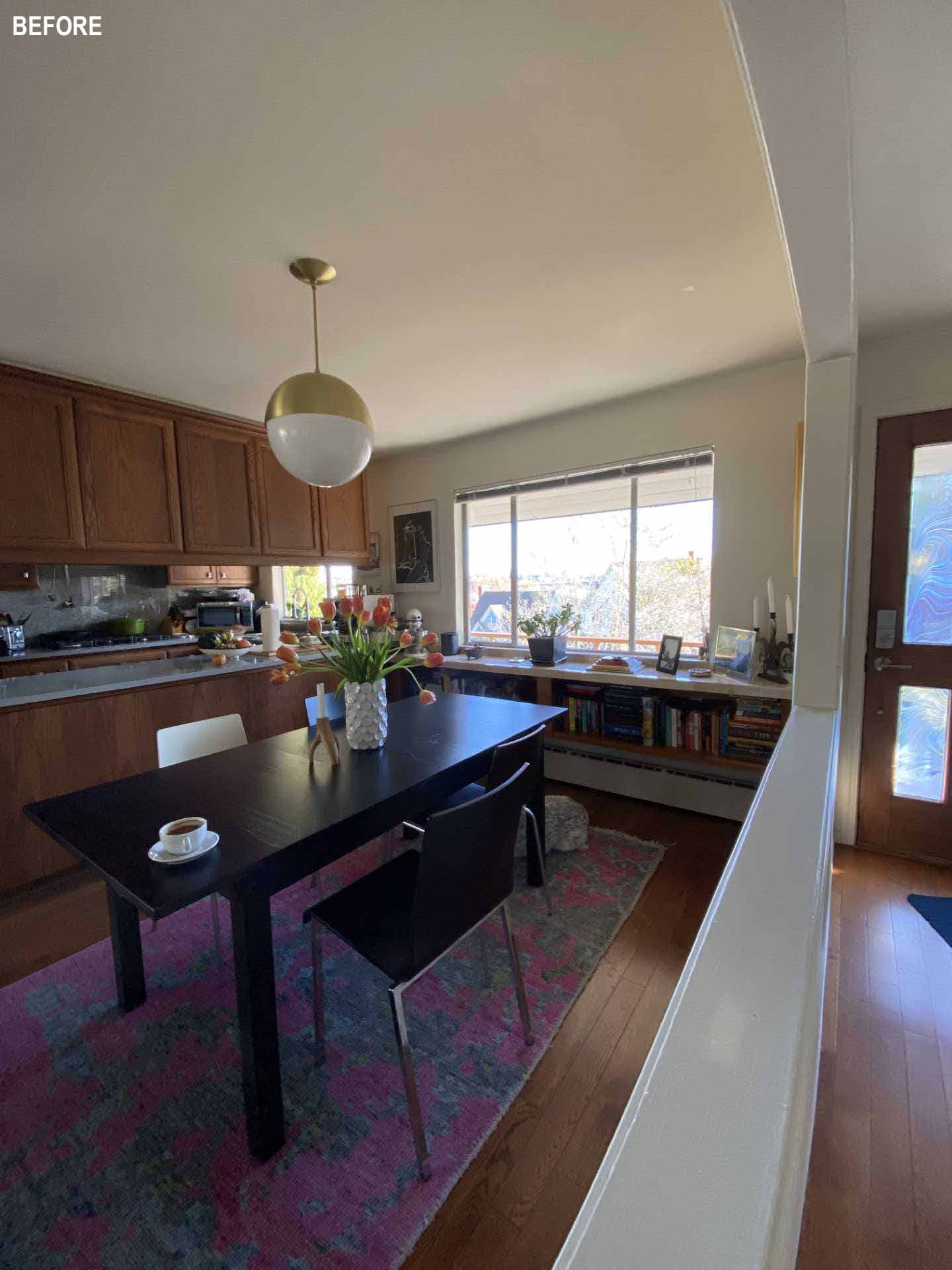 Before photos - A dark wood kitchen and dining area before receiving a contemporary remodel.