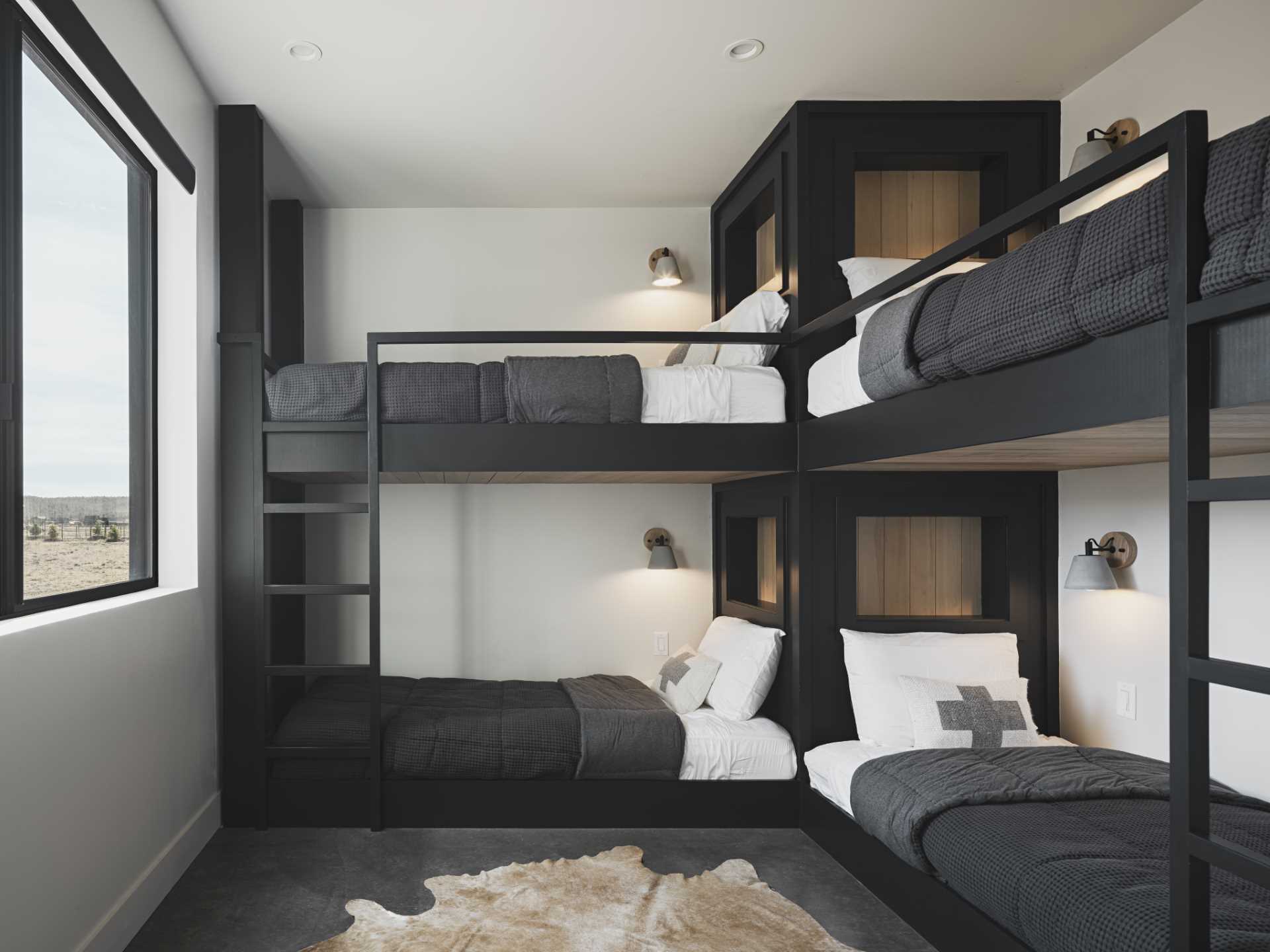 A modern bedroom filled with bunk beds.