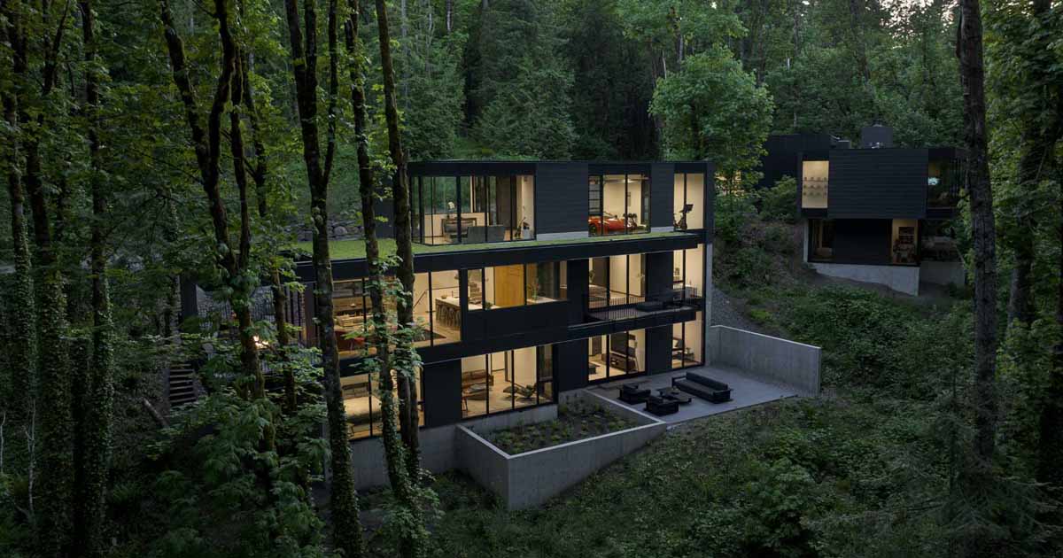 This Home Hidden In The Forest Appears Like A Stack Of Illuminated Boxes