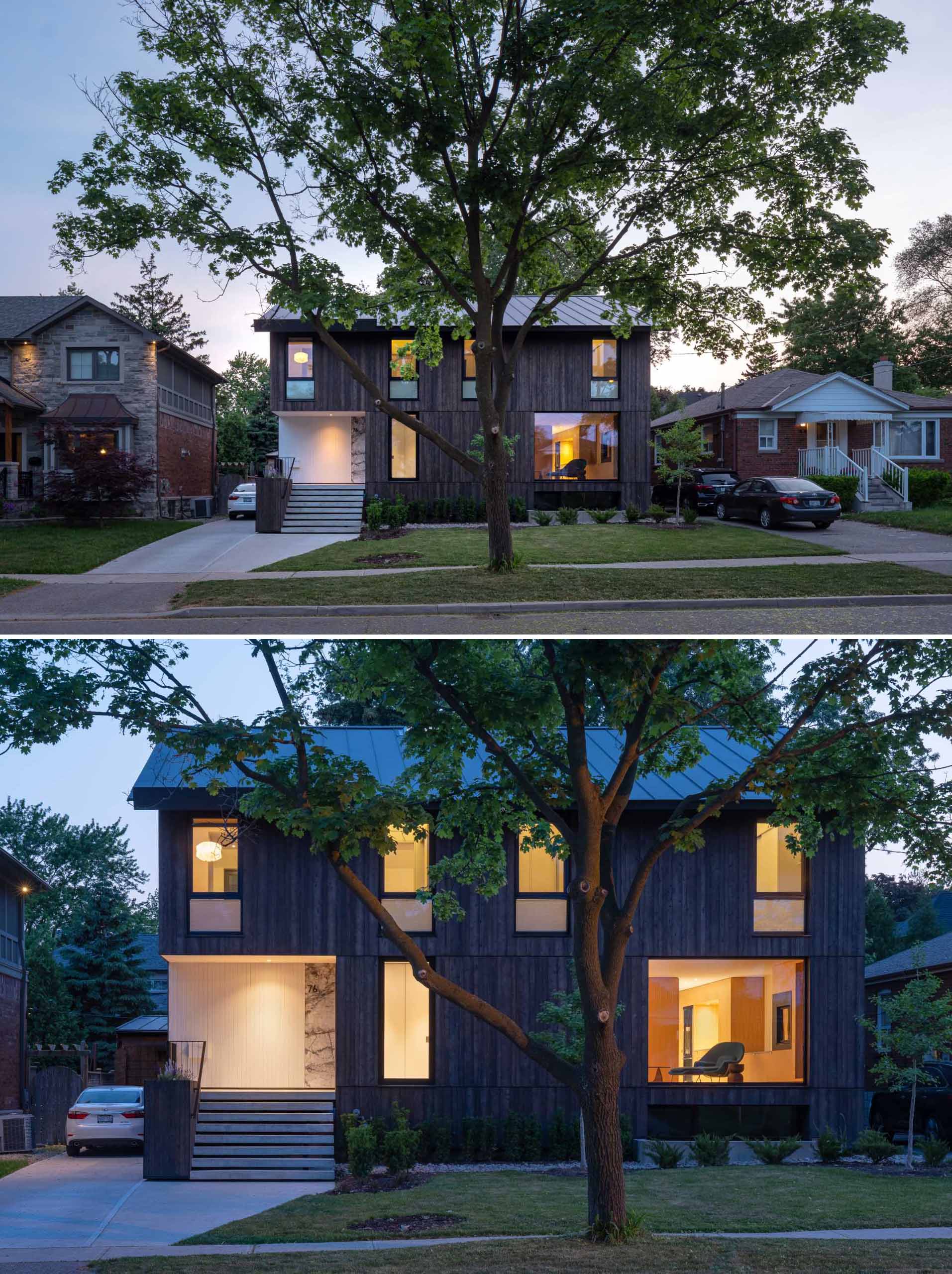 A modern house that's clad in custom charred cedar and has a pitched roof.