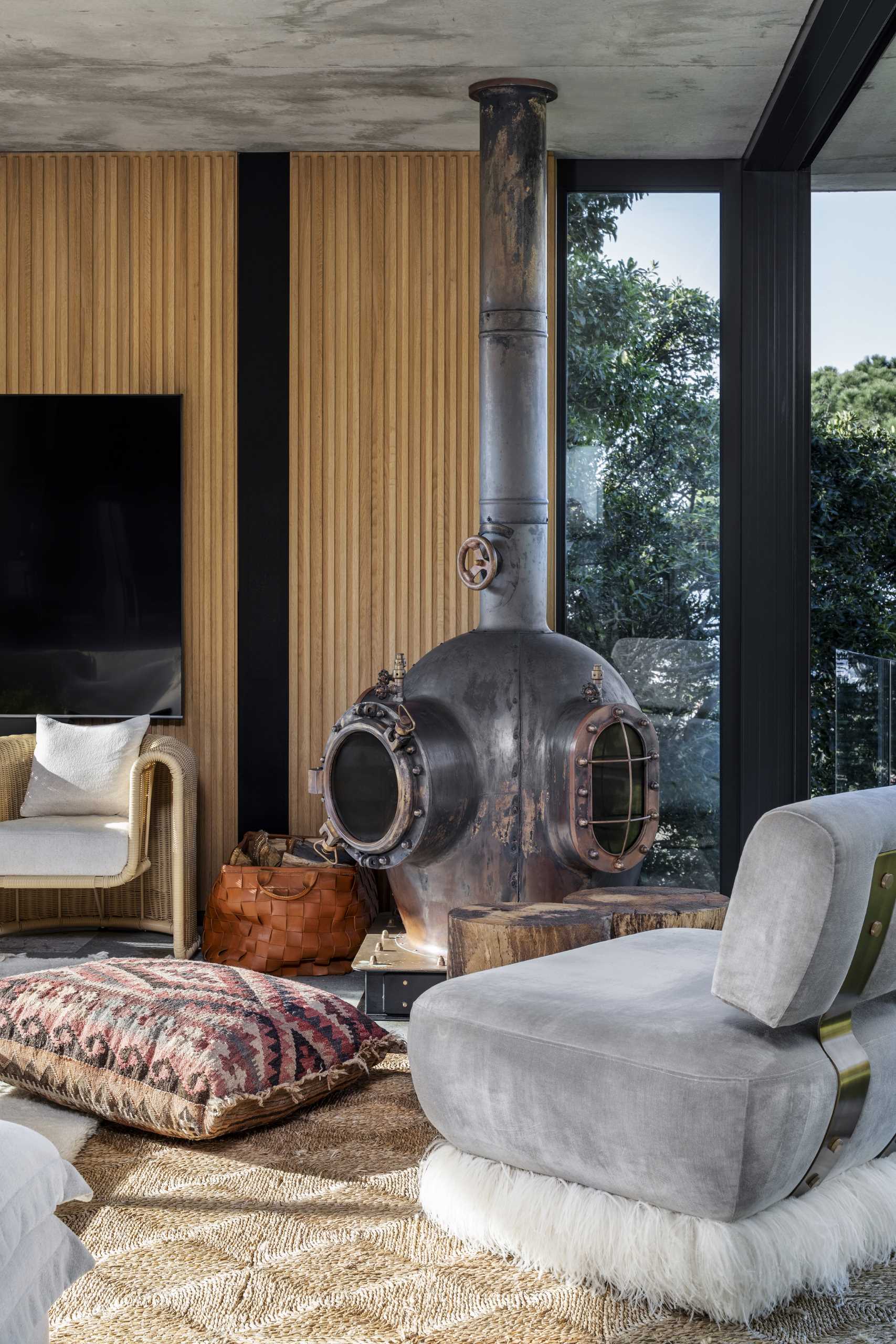 A fireplace inspired by a 1920s copper diving helmet.
