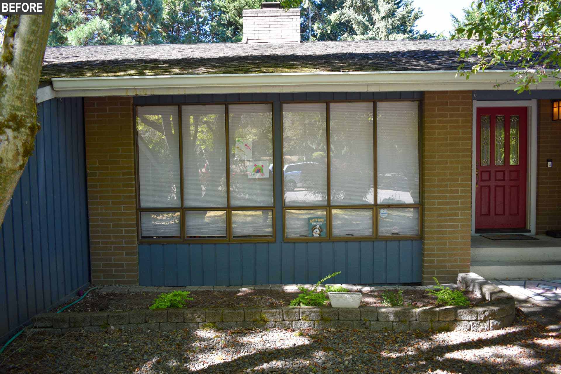 Before remodel - The original 1970s Seattle rambler had a typical boxy layout, while the exterior featured brick, and blue and red accents.