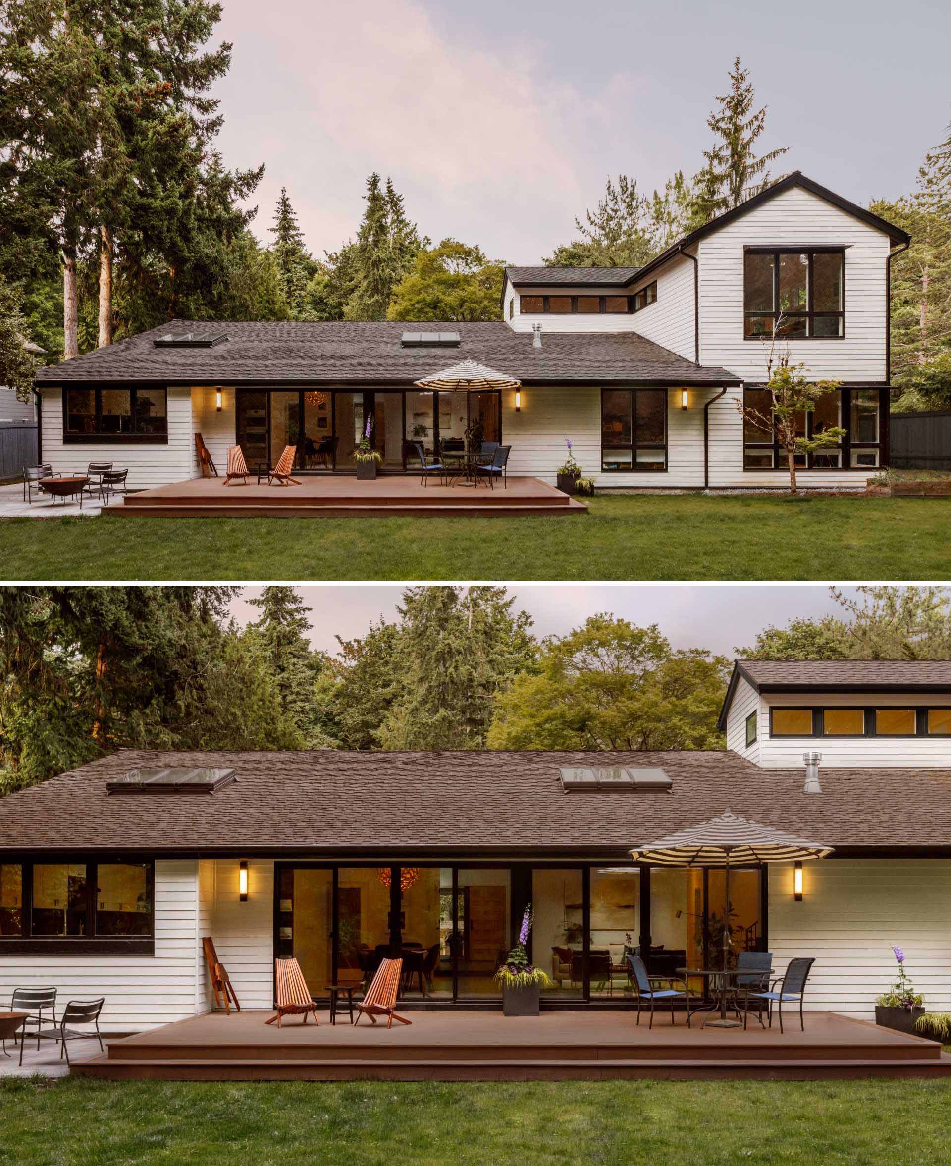 The updated rear of the home includes a warm wood deck, a fire pit area, and a "pop top" addition.