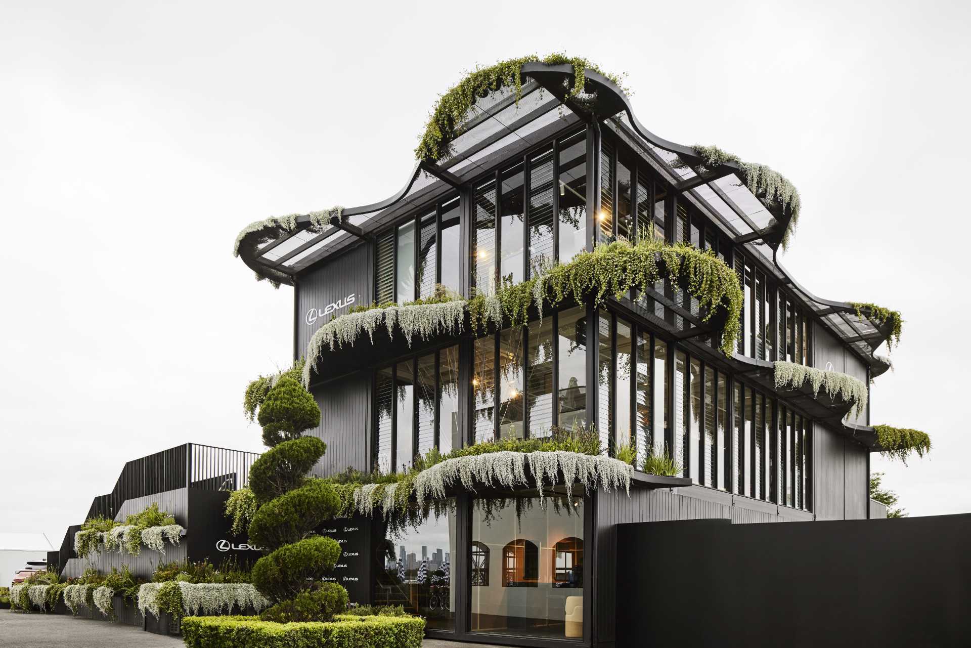 Drawing inspiration from the Australian landscape, Koichi Takada Architects designed a three-storey modular building that has over 1,000 native Australian plants and flowers on its facade.