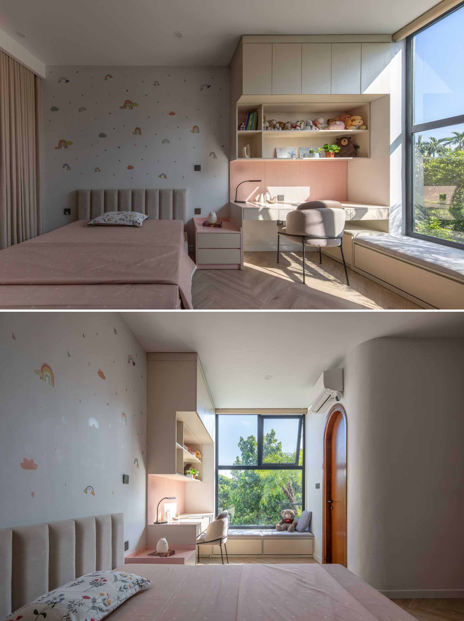 In this kids' bedroom, there's a custom-designed desk with shelving and cabinetry, as well as a bench underneath the window. On the opposite wall, there's the door to the ensuite bathroom and a floor-to-ceiling closet.