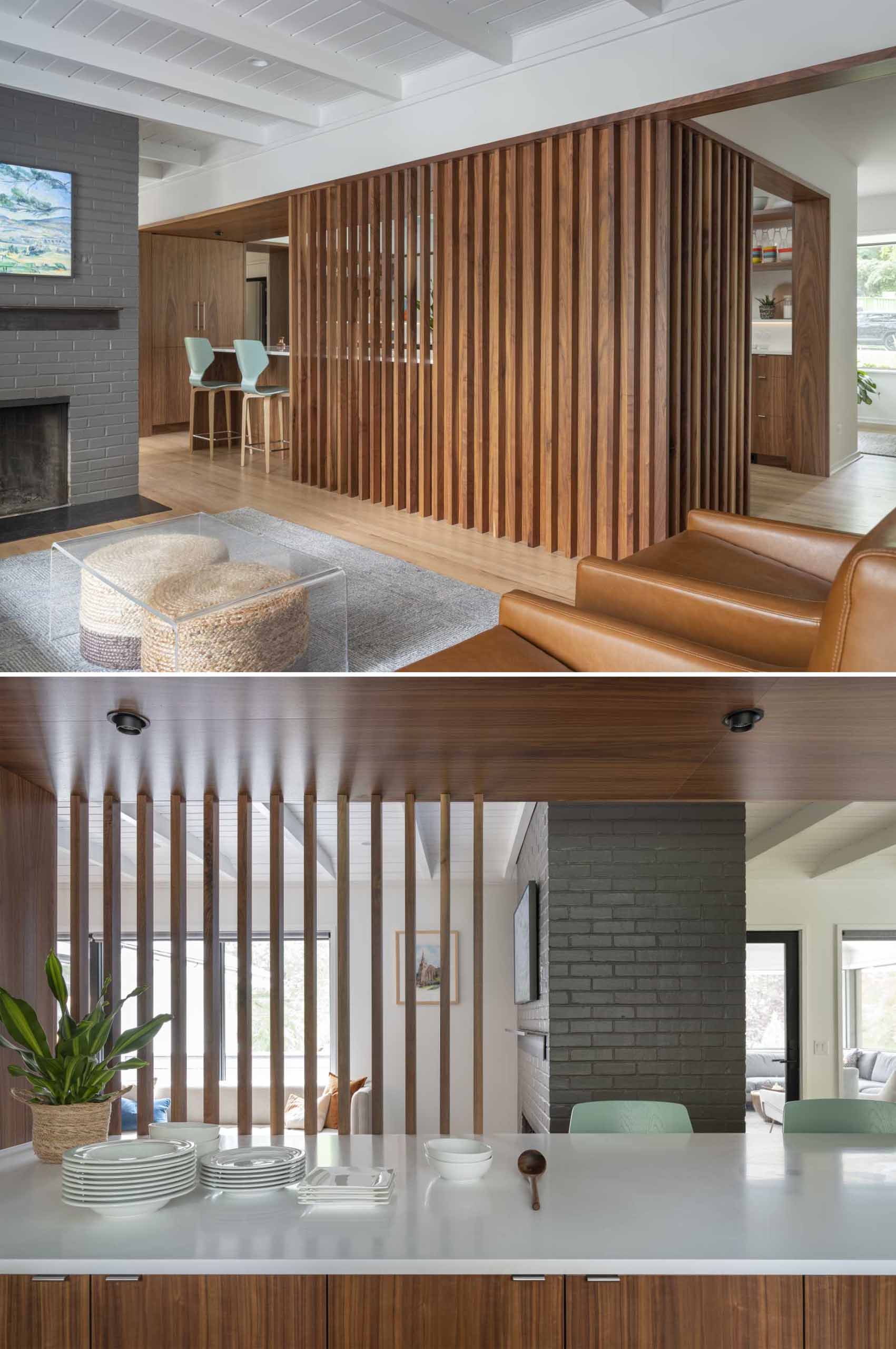 A wood slat accent wall helps to define the kitchen, keeping it partially hidden from view, but allowing the light to travel throughout the spaces.