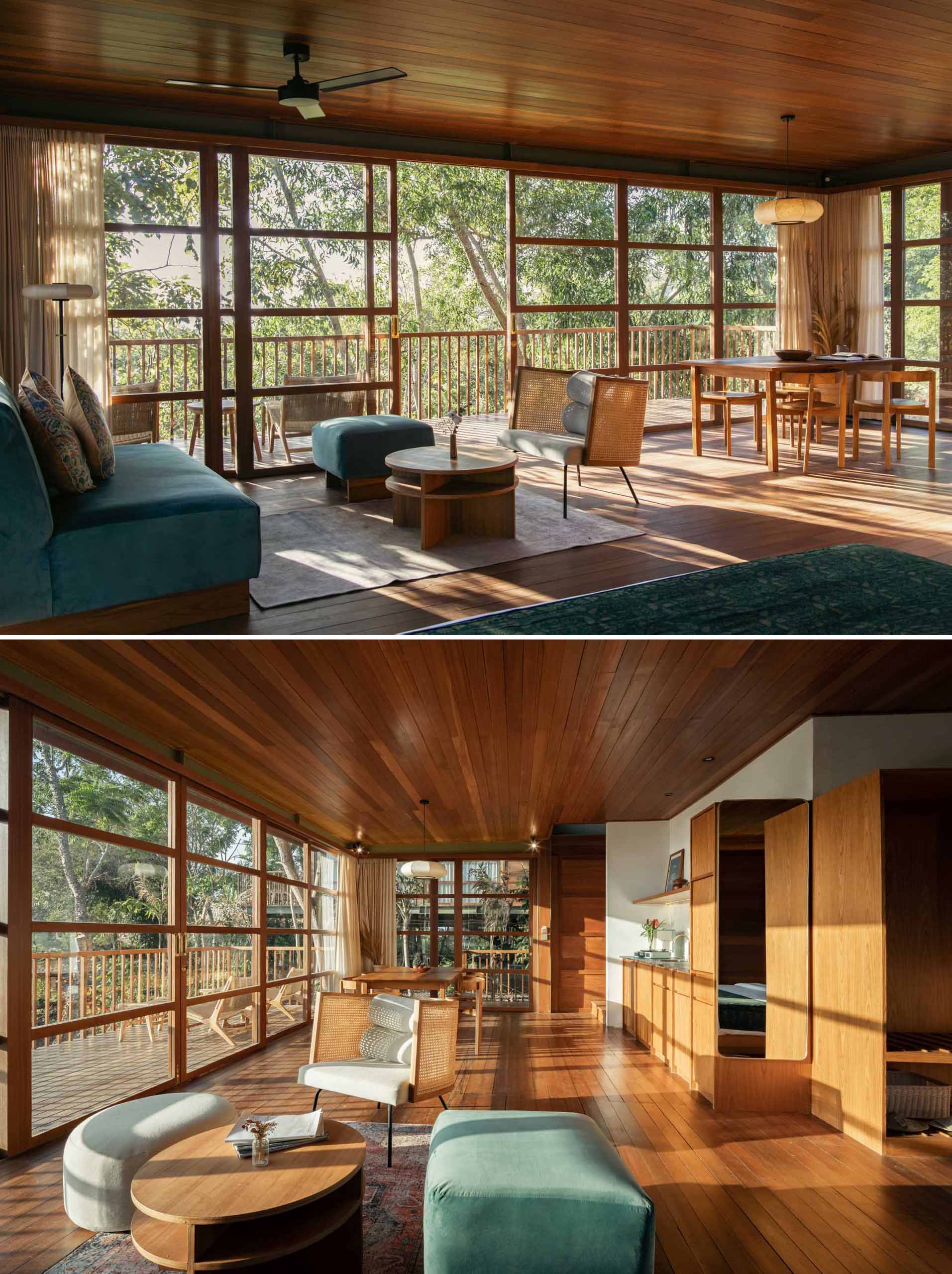 The dining area and kitchenette in this villa lead into the living room, with sliding doors opening to a balcony that's the same width as the structure.