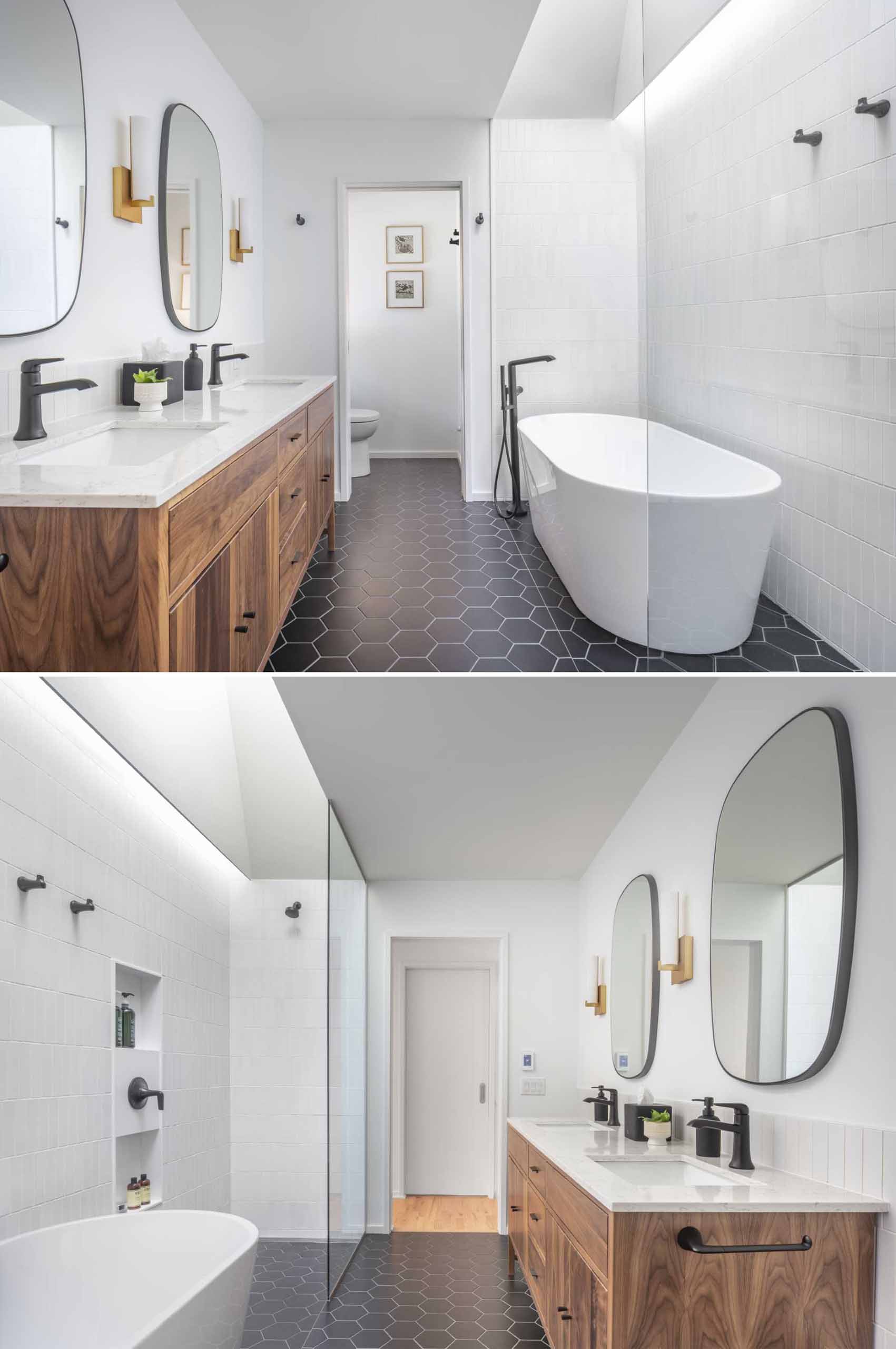 The primary bathroom has a hexagonal tile floor and a skylit wet zone containing the shower and tub.