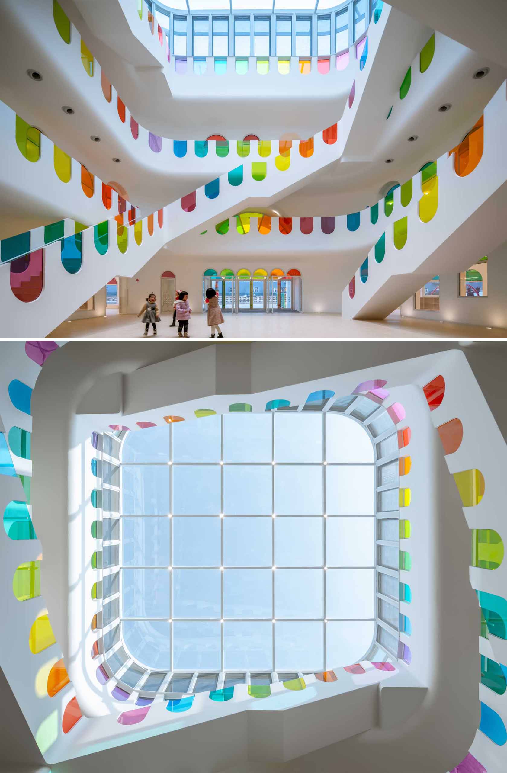 A modern white kindergarten features 10 different colors of colored glass throughout its design.