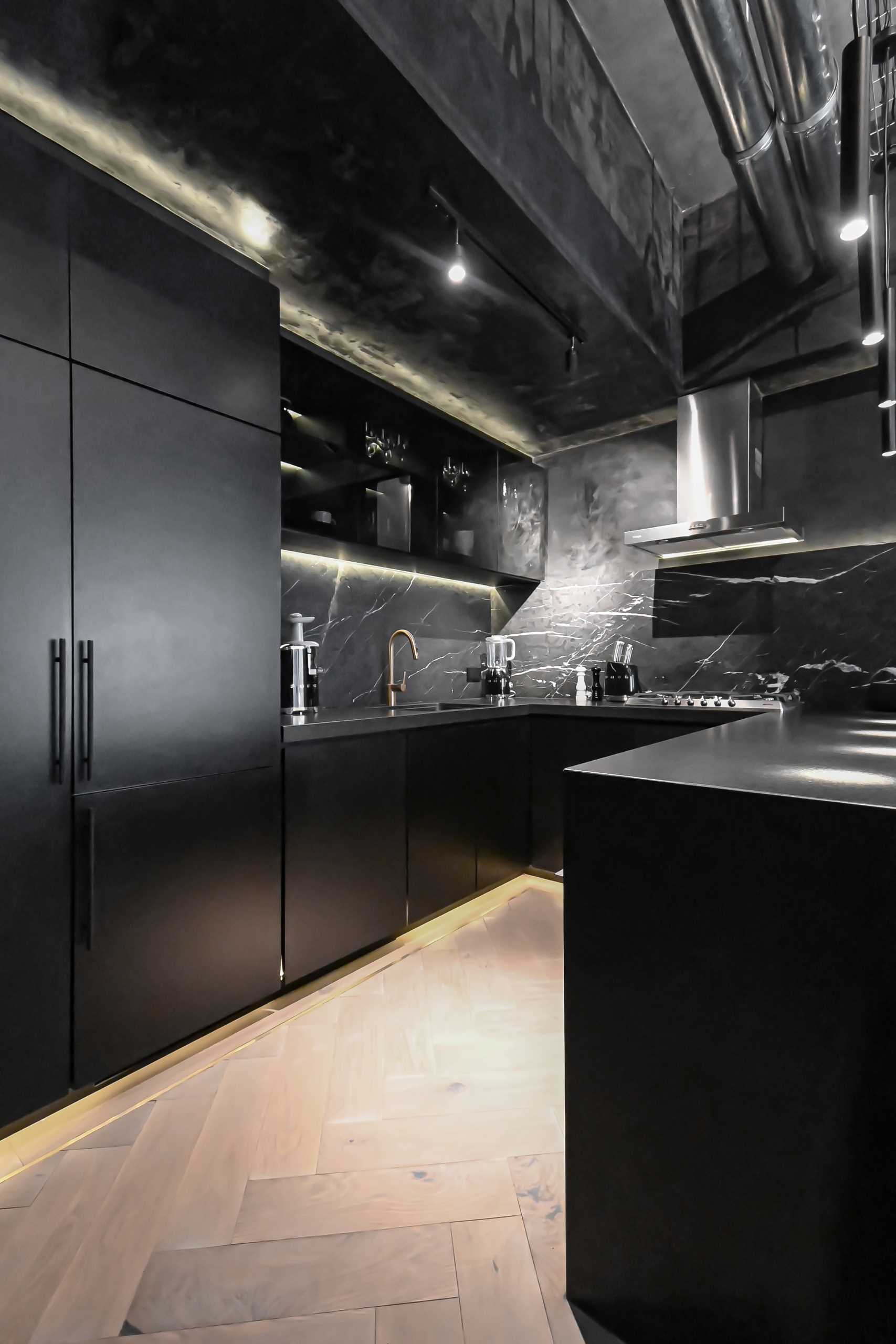A modern black kitchen.
