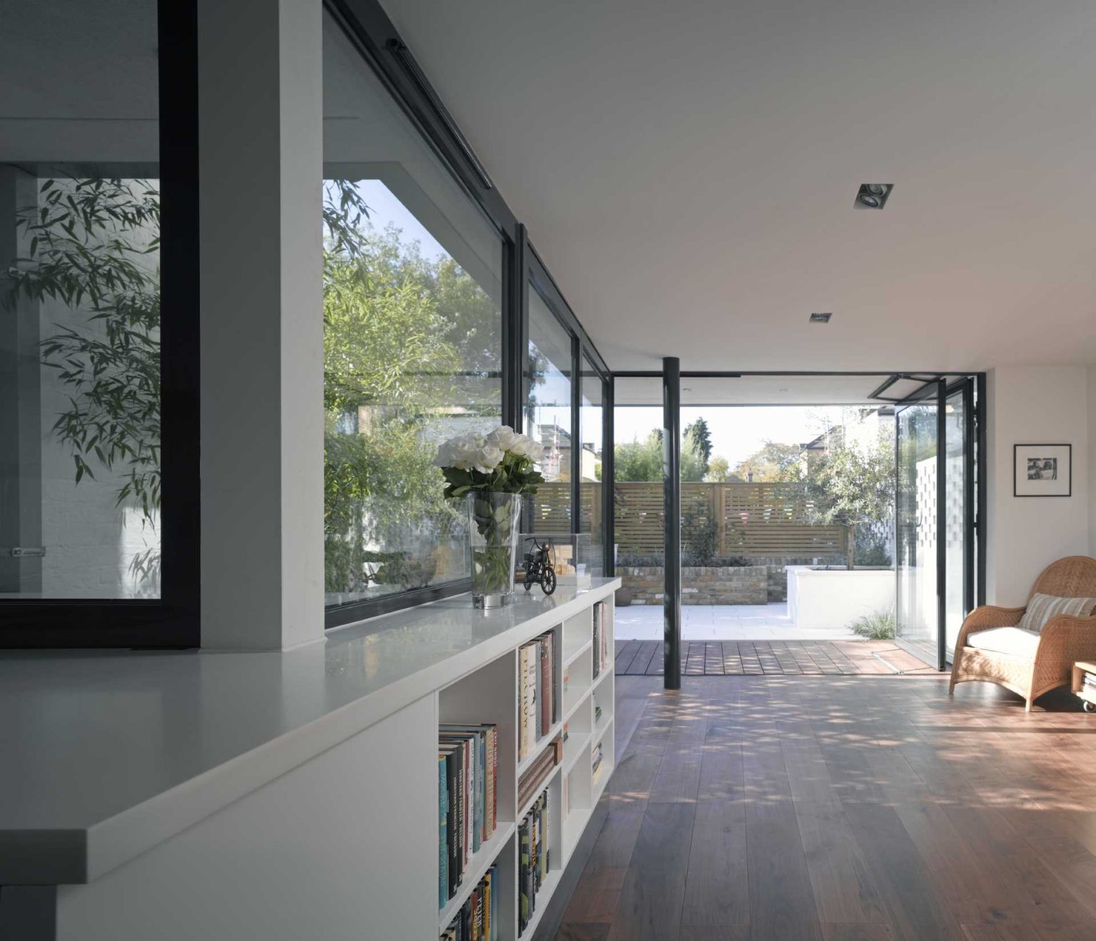 A Home Renovation Where The Walls Were Removed So The Interior Connects ...