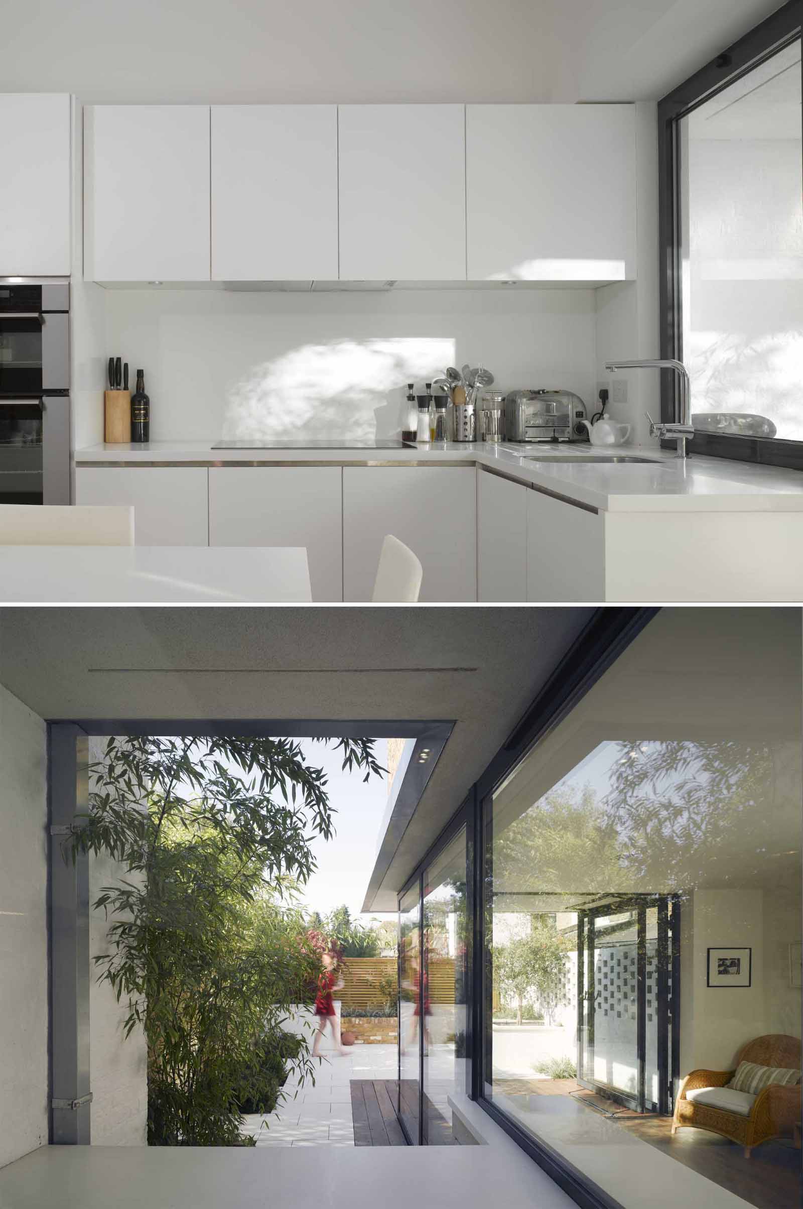 The windows and doors create a connection with the garden, while the kitchen countertop is replicated on the other side of the window.