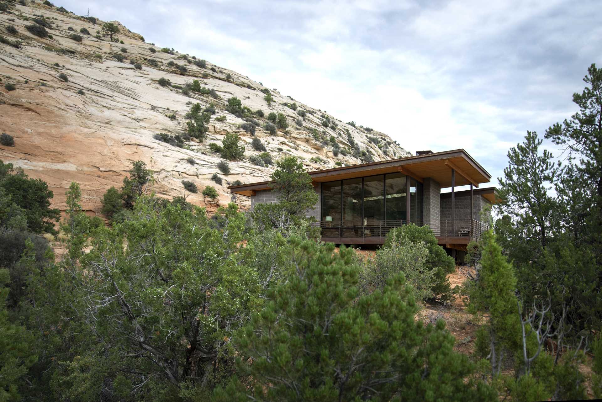 A modern desert home that features weathering steel, split-face concrete block, and cedar.