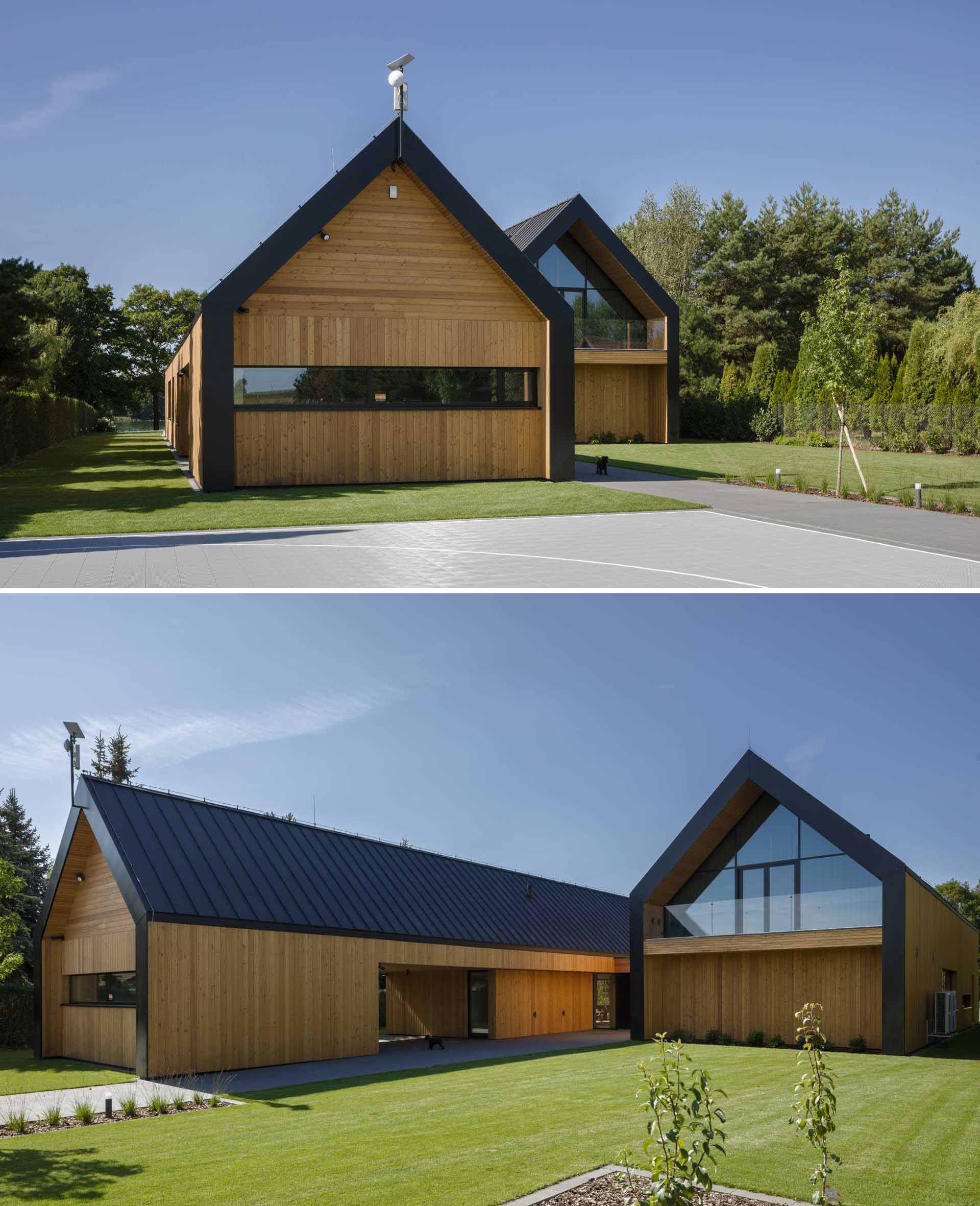 A modern house that has a layout similar to two barns positioned side-by-side.