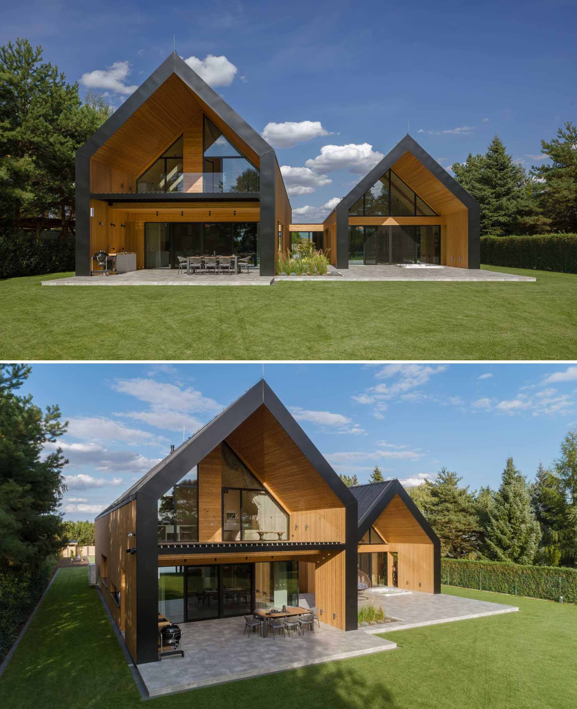A modern house that has a layout similar to two barns positioned side-by-side.