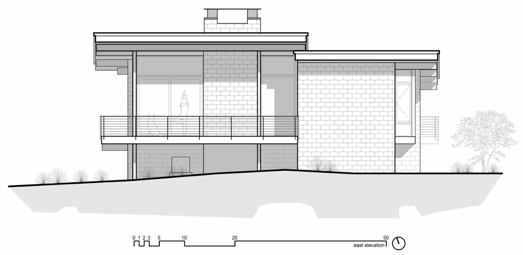 The elevation plan of a modern desert home that features weathering steel, split-face concrete block, and cedar.