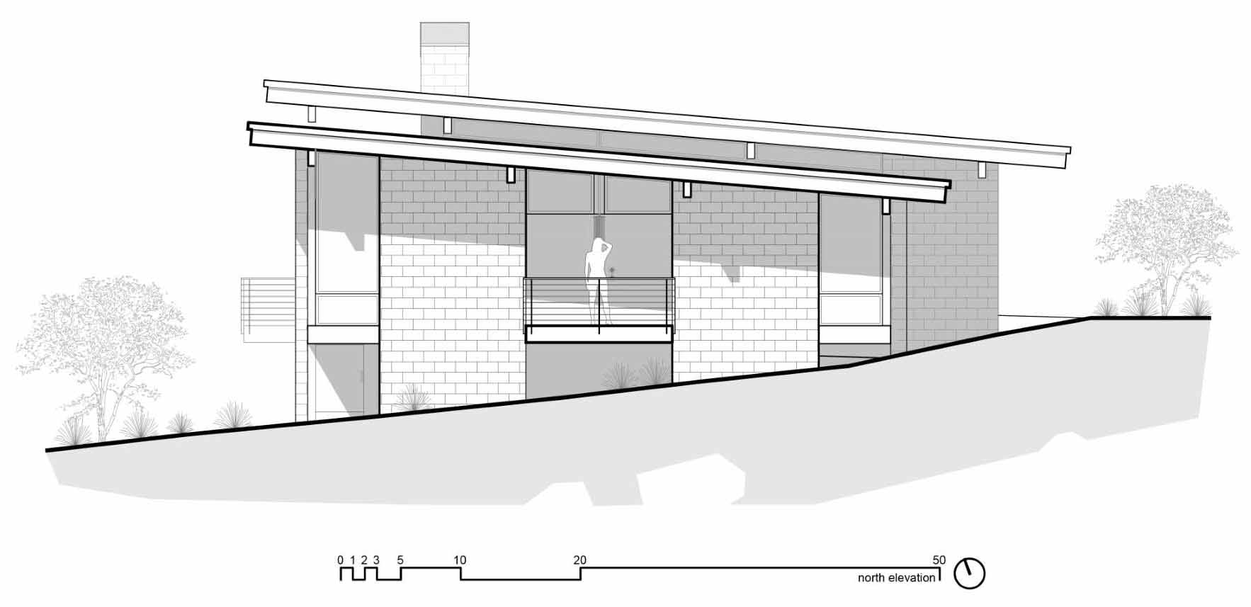 The elevation plan of a modern desert home that features weathering steel, split-face concrete block, and cedar.