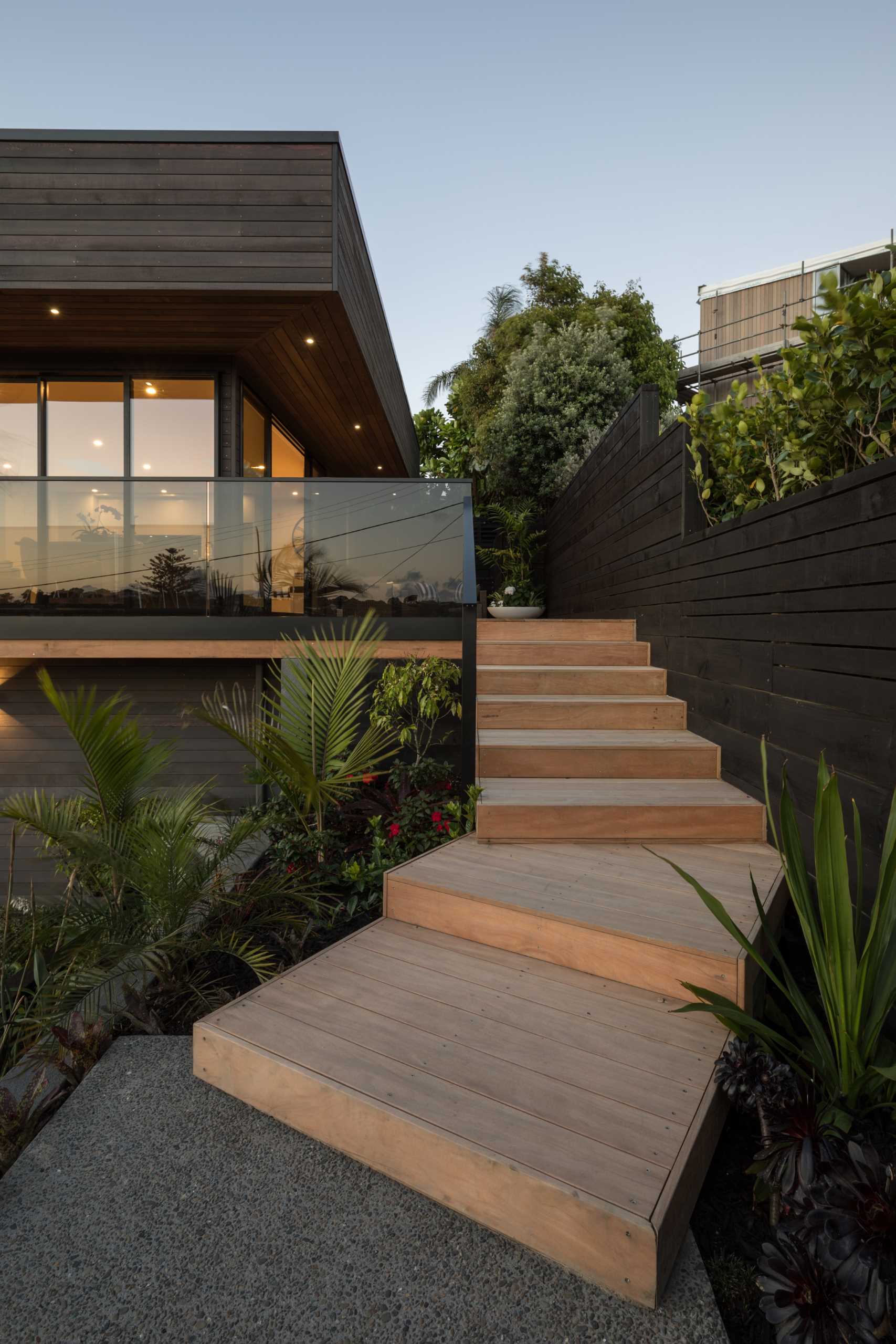 Wood stairs that travel through the garden.