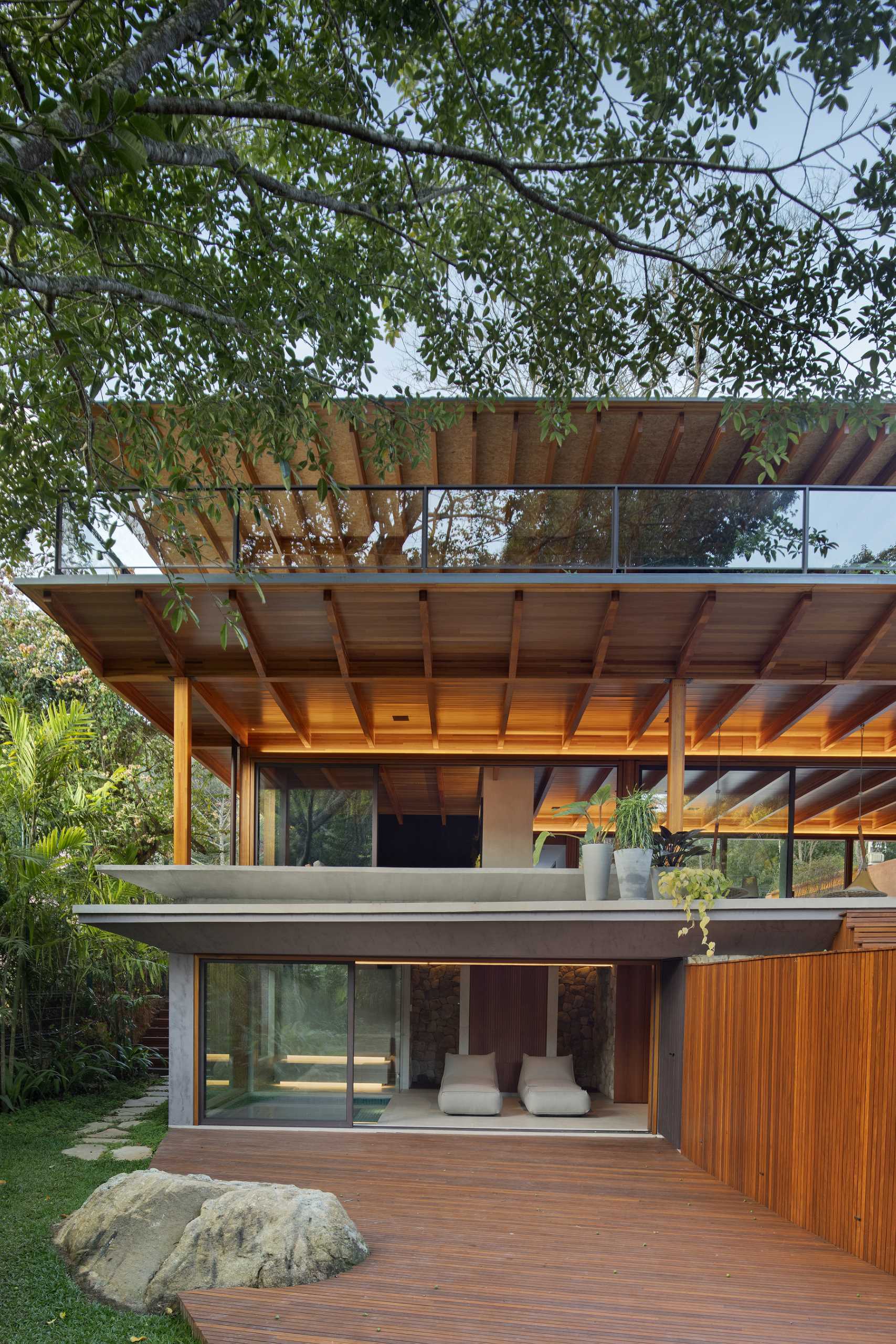 Steps from the deck lead down to a lower level, where there's a small pool and a sauna.