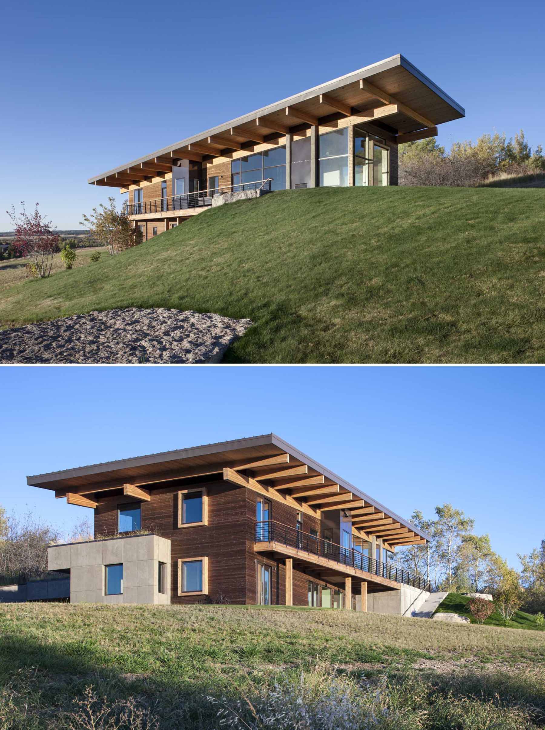 A modern post and beam house with wood siding.