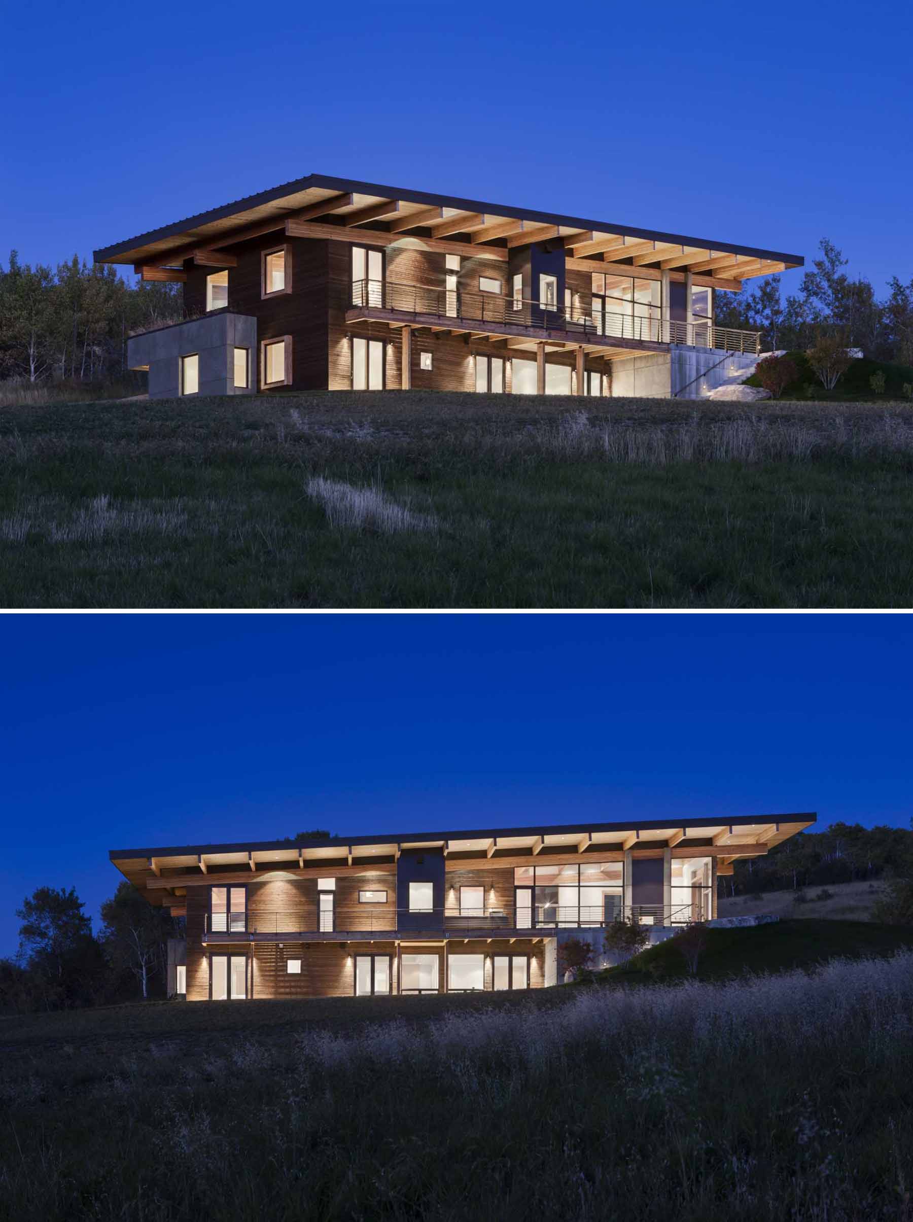A modern post and beam house with wood siding.