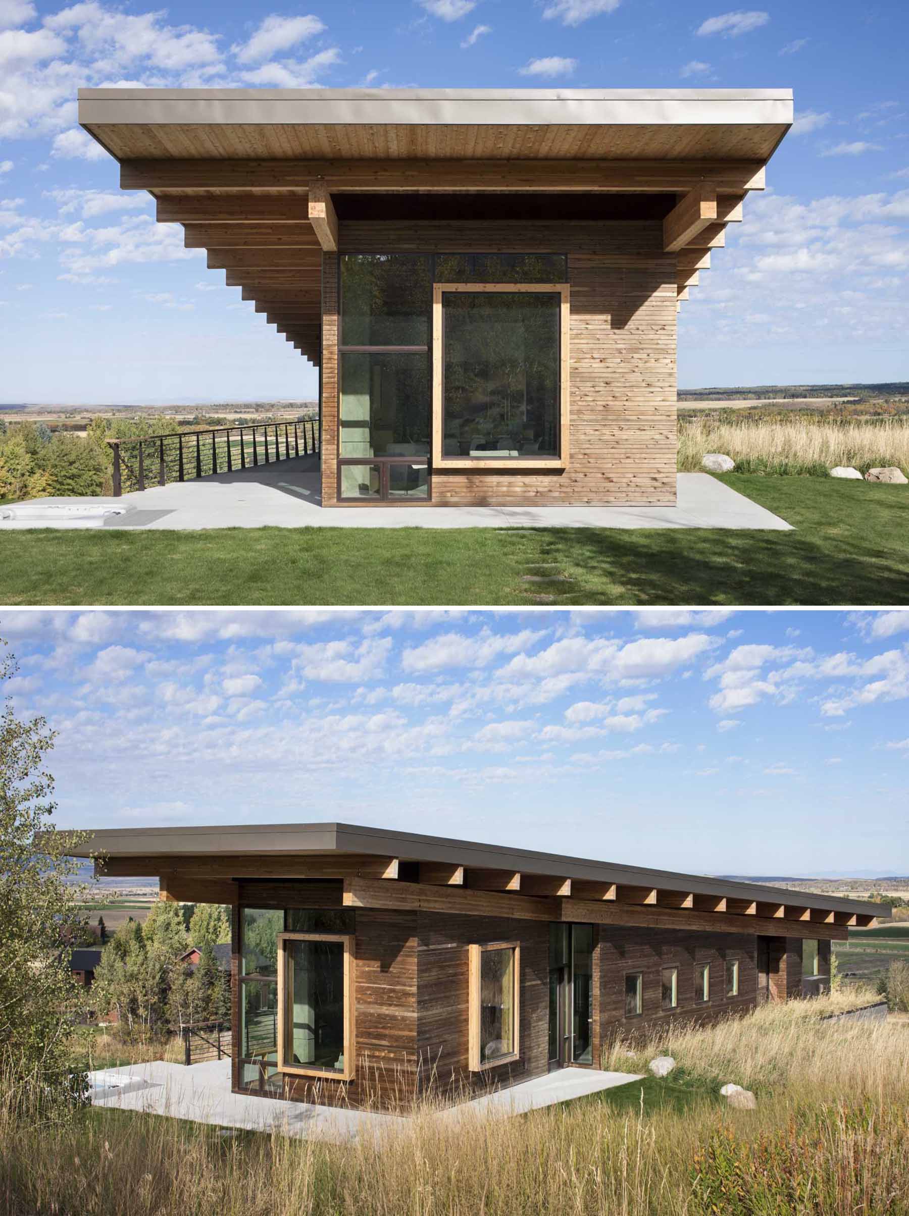 A modern post and beam house with wood siding.