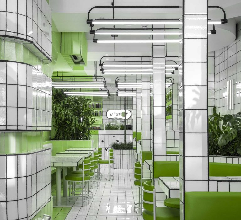 A Green And White Tiled Design Was Created For This Vegan Cafe