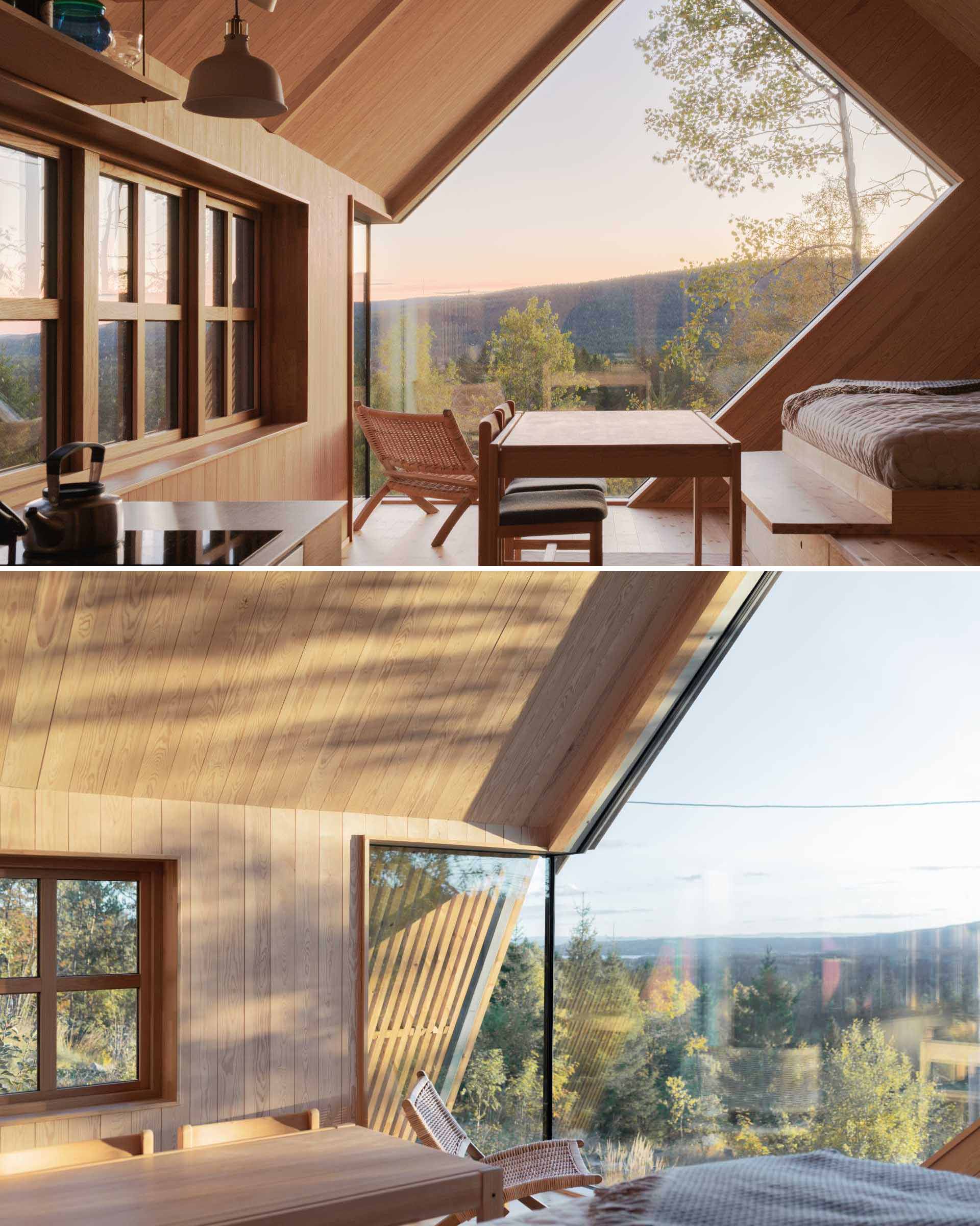 A contemporary cabin designed to include a uniquely shaped window that perfectly frames the sunset.