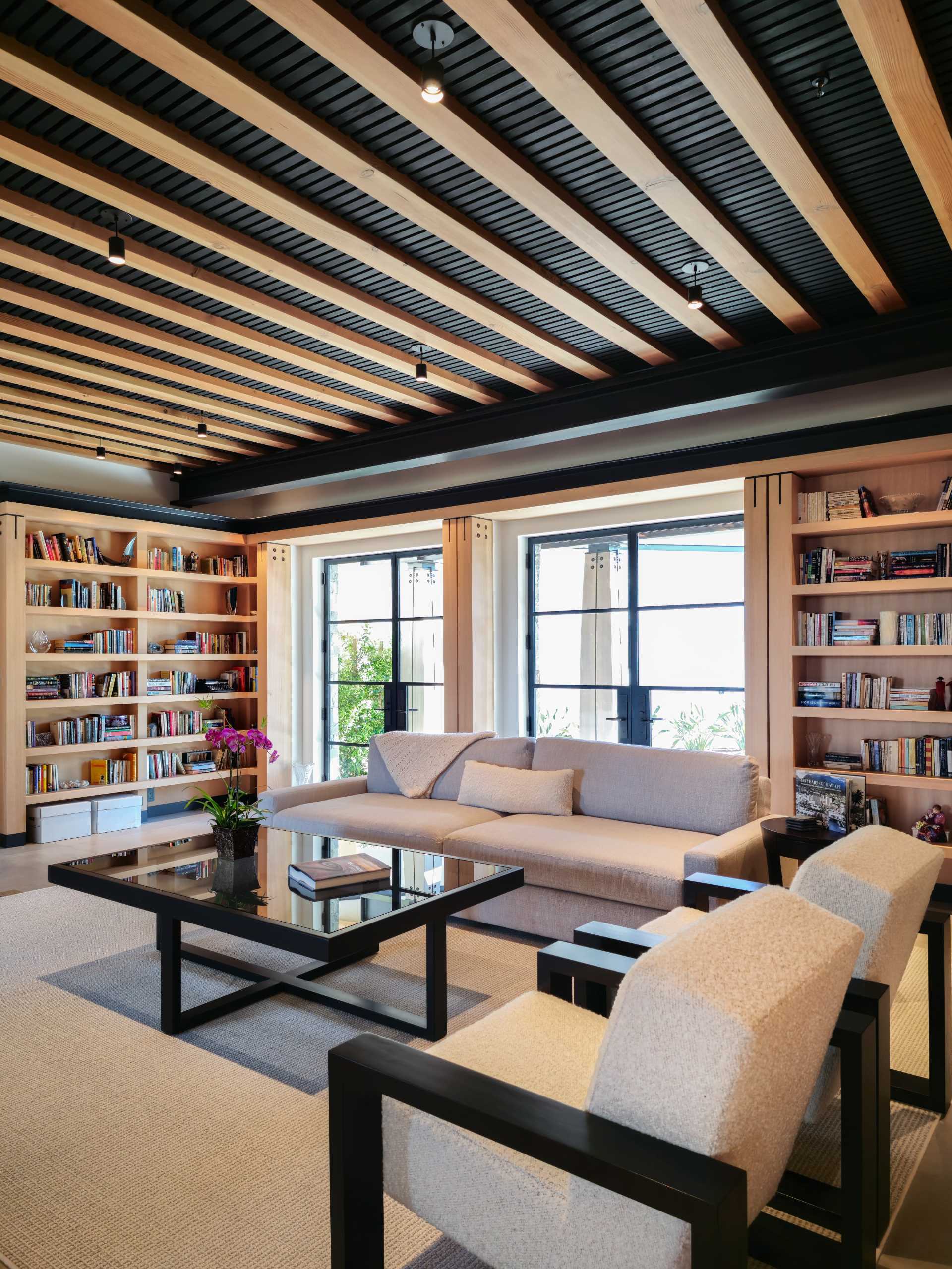 A contemporary house with built-in bookshelves.