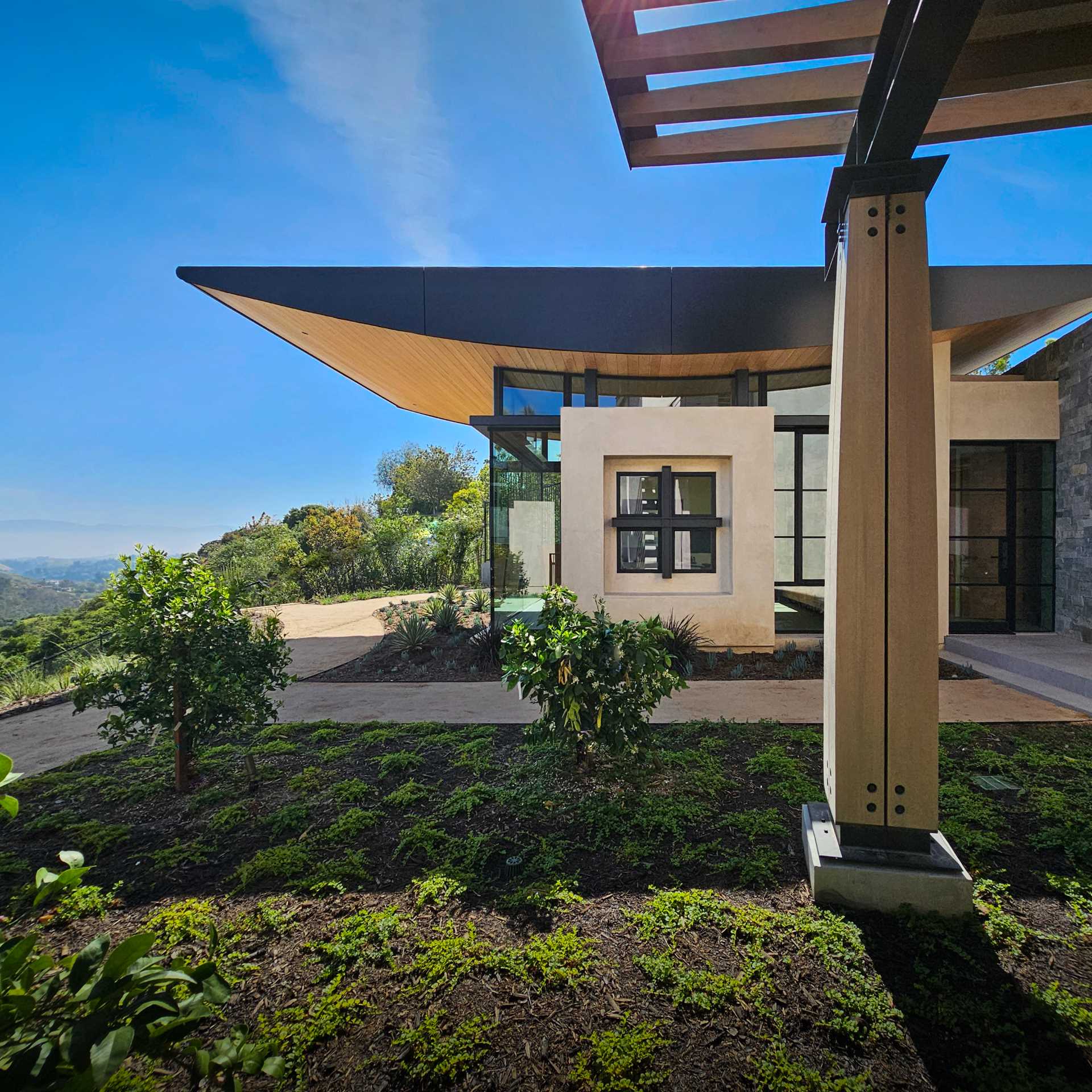 The stone and heavy timber of this home evoke a sense of stability and permanence, while steel and glass allow the structure to open up to its surroundings.