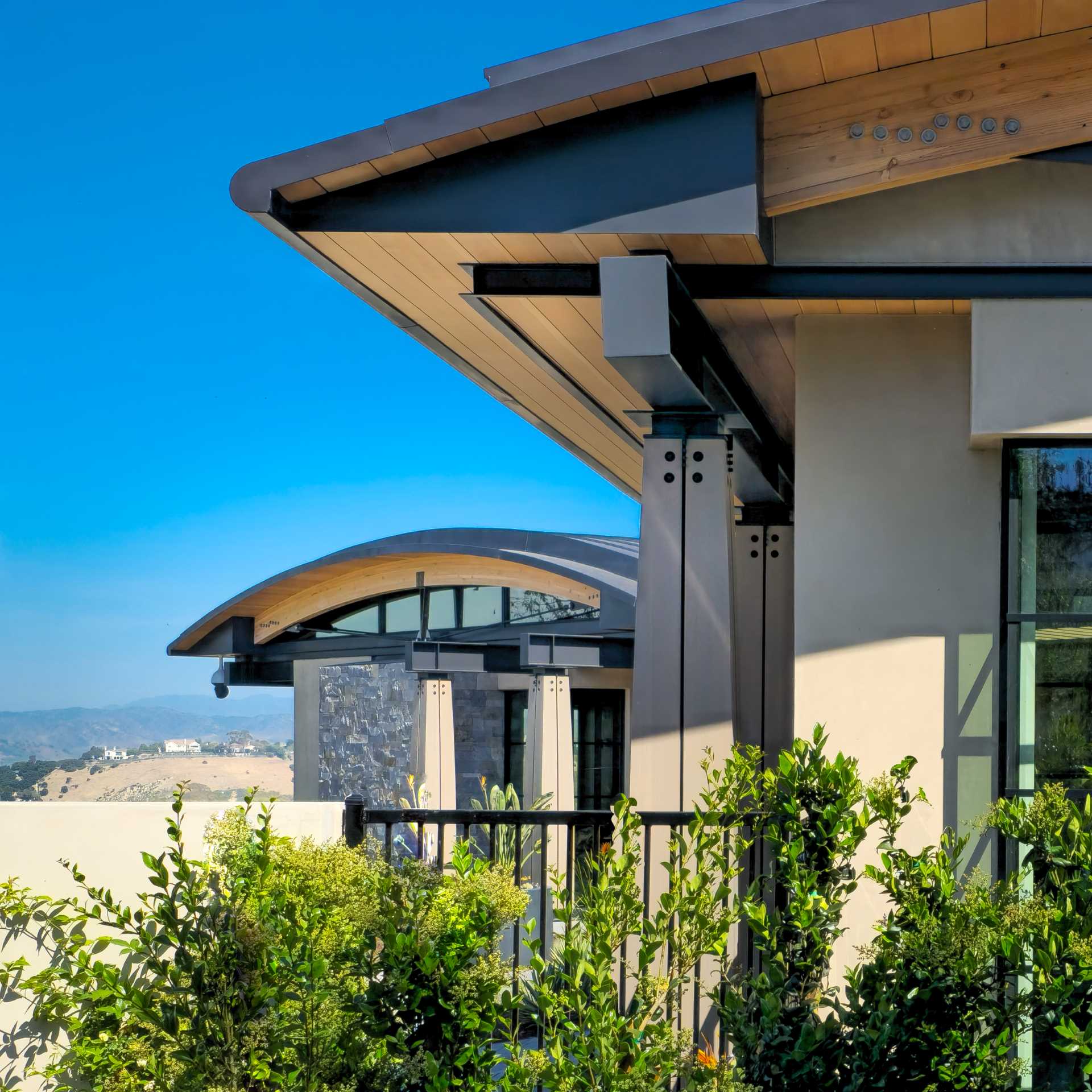 The stone and heavy timber of this home evoke a sense of stability and permanence, while steel and glass allow the structure to open up to its surroundings.